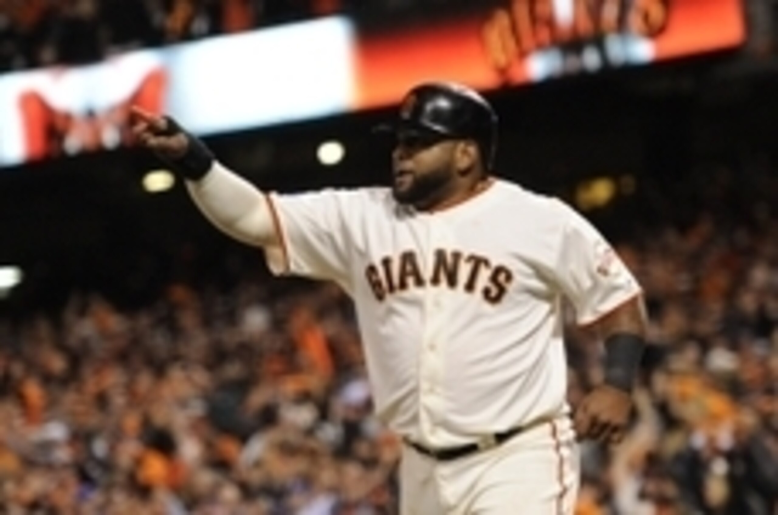 Oct 26, 2014; San Francisco, CA, USA; San Francisco Giants third baseman Pablo Sandoval reacts after scoring a run against the Kansas City Royals in the 8th inning during game five of the 2014 World Series at AT&T Park. Mandatory Credit: Christopher Hanew Oct 26, 2014; San Francisco, CA, USA; San Francisco Giants third baseman Pablo Sandoval reacts after scoring a run against the Kansas City Royals in the 8th inning during game five of the 2014 World Series at AT&T Park. Mandatory Credit: Christopher Hanew