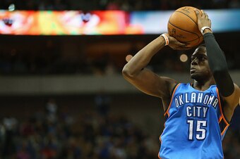 DALLAS, TX - DECEMBER 28:  Reggie Jackson #15 of the Oklahoma City Thunder takes a shot against the Dallas Mavericks at American Airlines Center on December 28, 2014 in Dallas, Texas.  NOTE TO USER: User expressly acknowledges and agrees that, by download