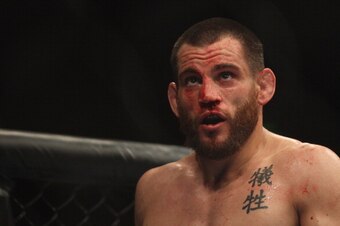 SYDNEY, AUSTRALIA - FEBRUARY 27:  Jon Fitch of the USA looks at the big screen after the first round in his fight against BJ Penn of the USA during their welterweight bout part of  UFC 127 at Acer Arena on February 27, 2011 in Sydney, Australia.  (Photo b
