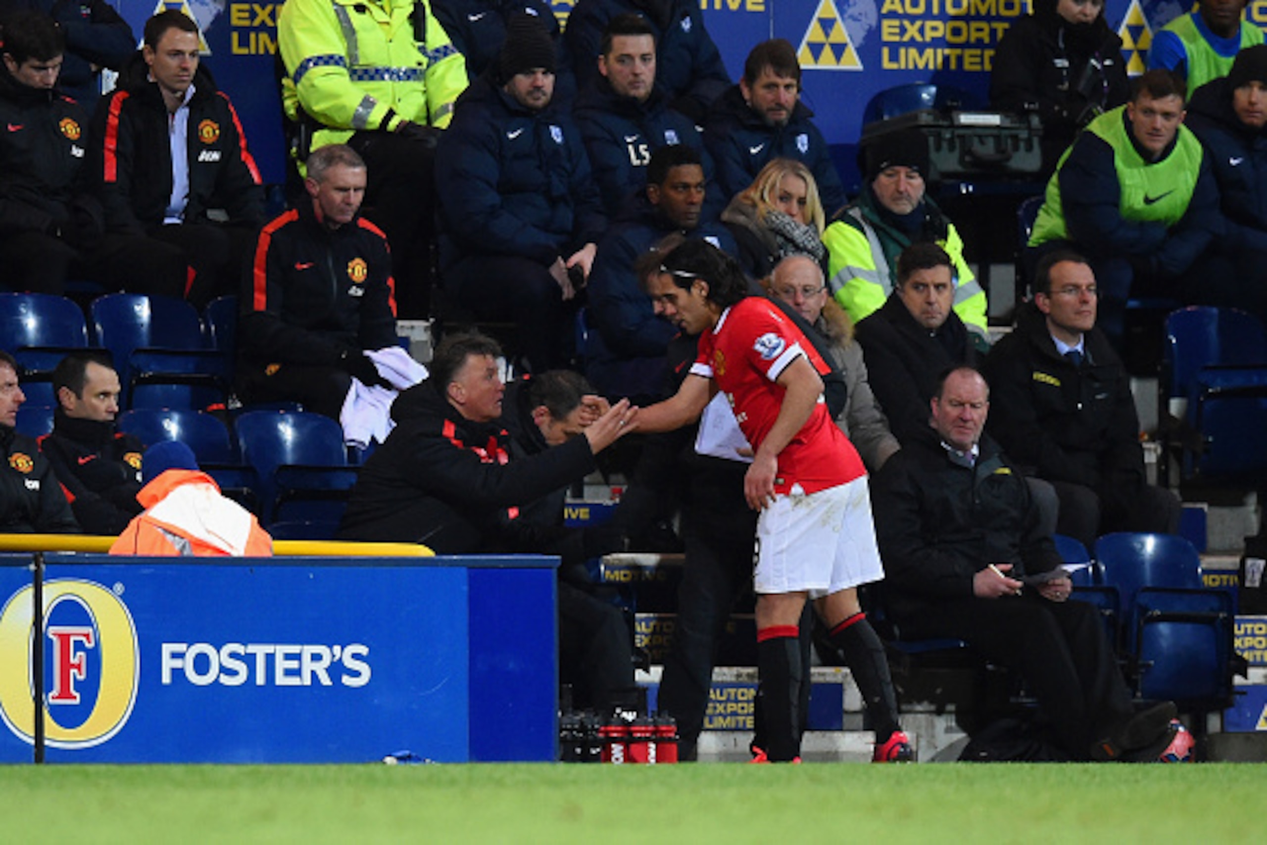 PRESTON, ENGLAND - FEBRUARY 16:  Manager Louis van Gaal of Manchester United shakes hands with Radamel Falcao García of Manchester United as he is replaced during the FA Cup Fifth round match between Preston North End and Manchester United at Deepdale on 