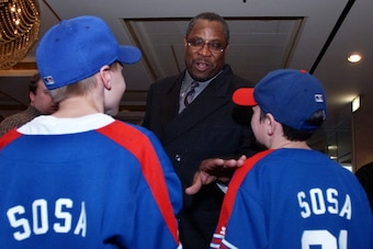 Cubs manager Dusty Baker with Sammy Sosa fans in 2003.