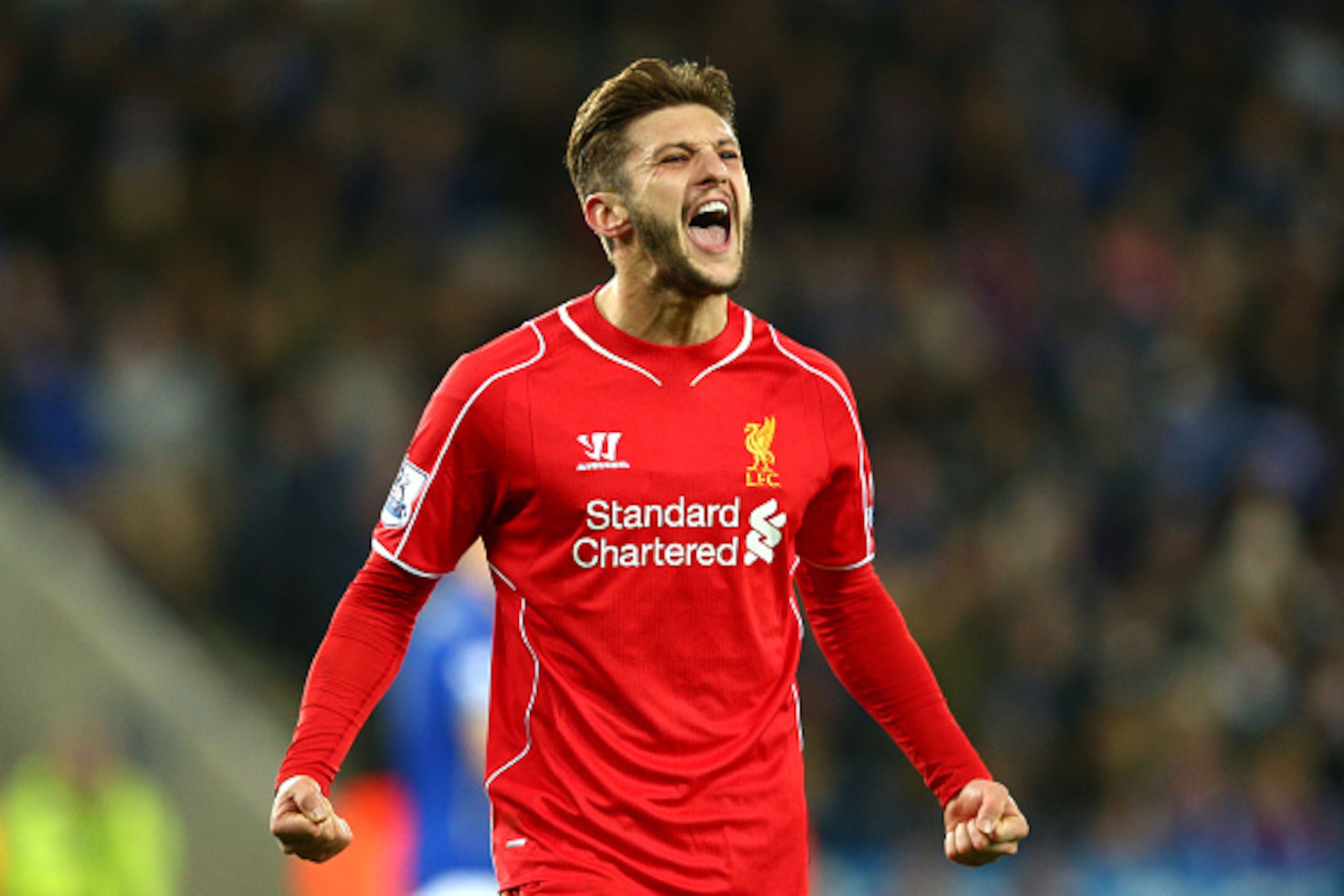 LEICESTER, ENGLAND - DECEMBER 02:  Adam Lallana of Liverpool celebrates after scoring a goal to level the scores at 1-1 during the Barclays Premier League match between Leicester City and Liverpool at The King Power Stadium on December 2, 2014 in Leiceste