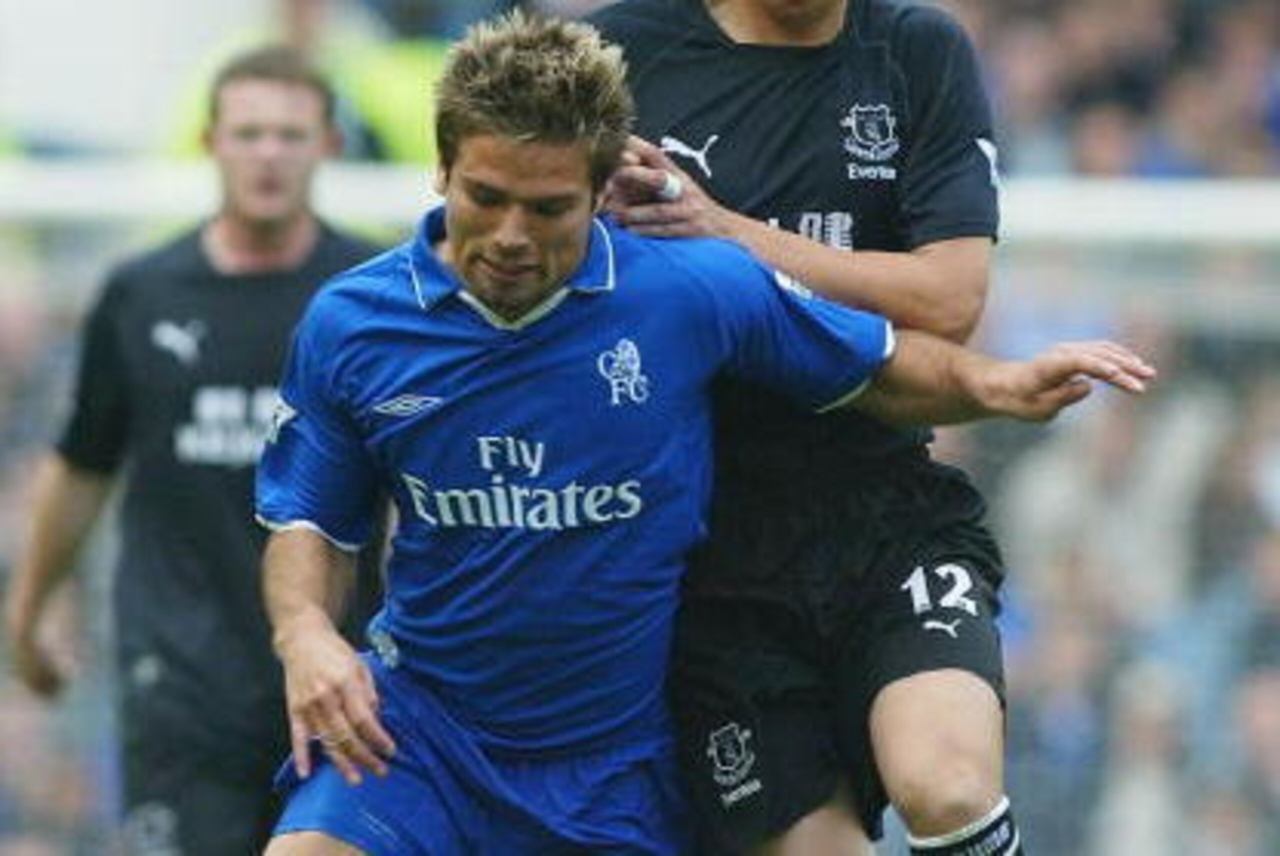 LONDON - APRIL 21:  Quique De Lucas of Chelsea battles with Li Tie of Everton during the FA Barclaycard Premiership match on April 21, 2003 between Chelsea and Everton at Stamford Bridge in London. (Photo By Ben Radford/Getty Images)