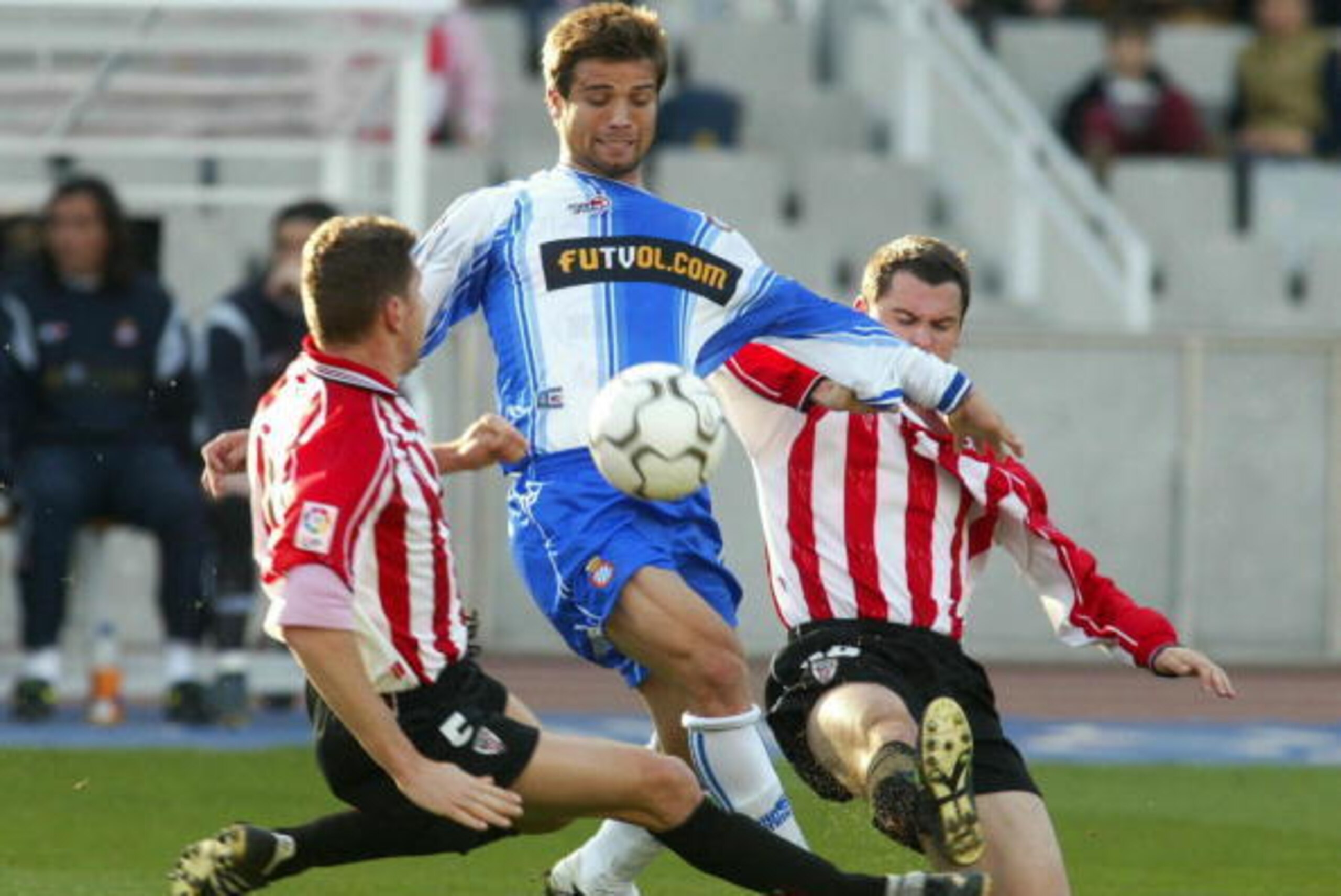10 Mar 2002:  Quique de Lucas of Espanyol and Carlos Garcia (left) and Orbaiz (right) of Athletic BIlbao in action during the Espanyol v Athletic Bilbao match, of the Spanish Primera League, played at the Olympico de Montjuic Stadium. DIGITAL IMAGE. Manda