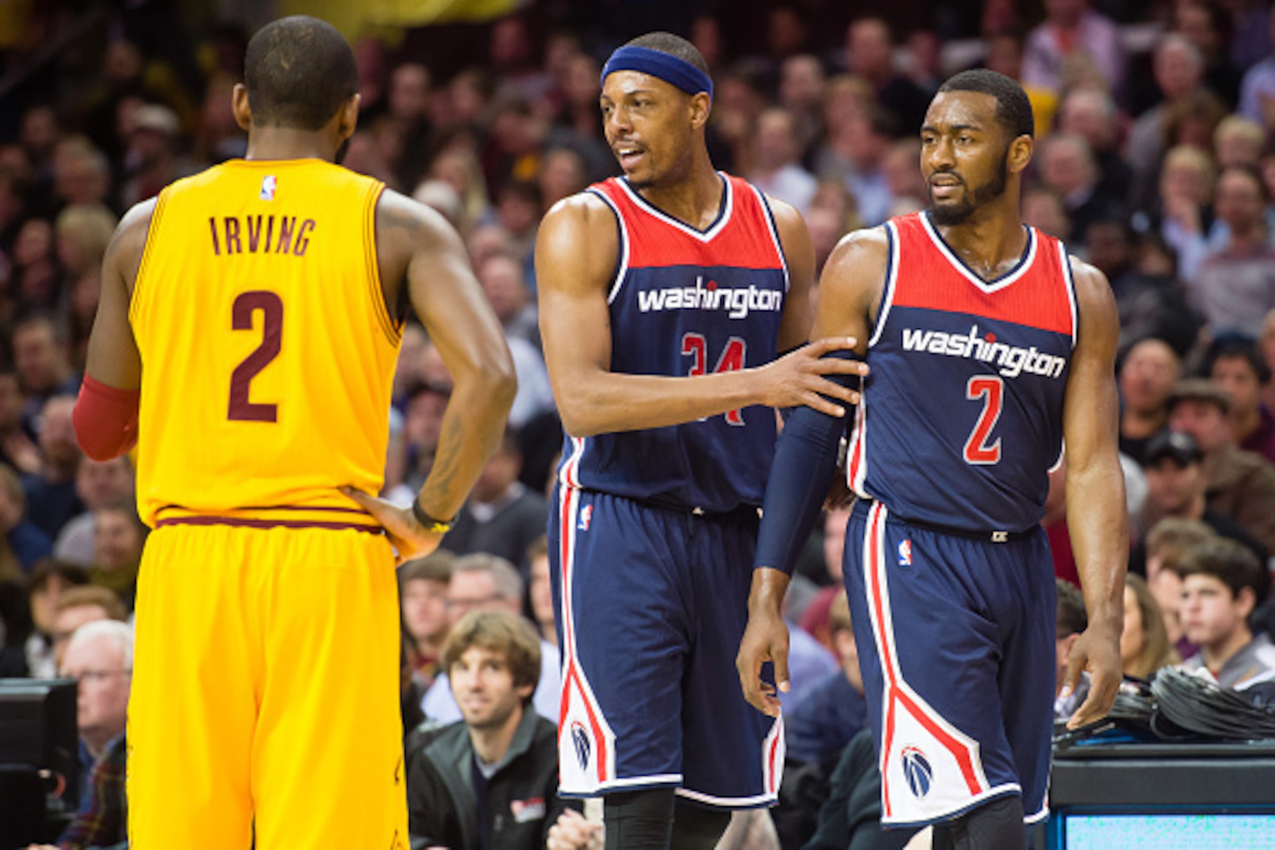 CLEVELAND, OH - NOVEMBER 26: Kyrie Irving #2 of the Cleveland Cavaliers watches as Paul Pierce #34 pulls away John Wall #2 of the Washington Wizards after an argument during the second half at Quicken Loans Arena on November 26, 2014 in Cleveland, Ohio. T