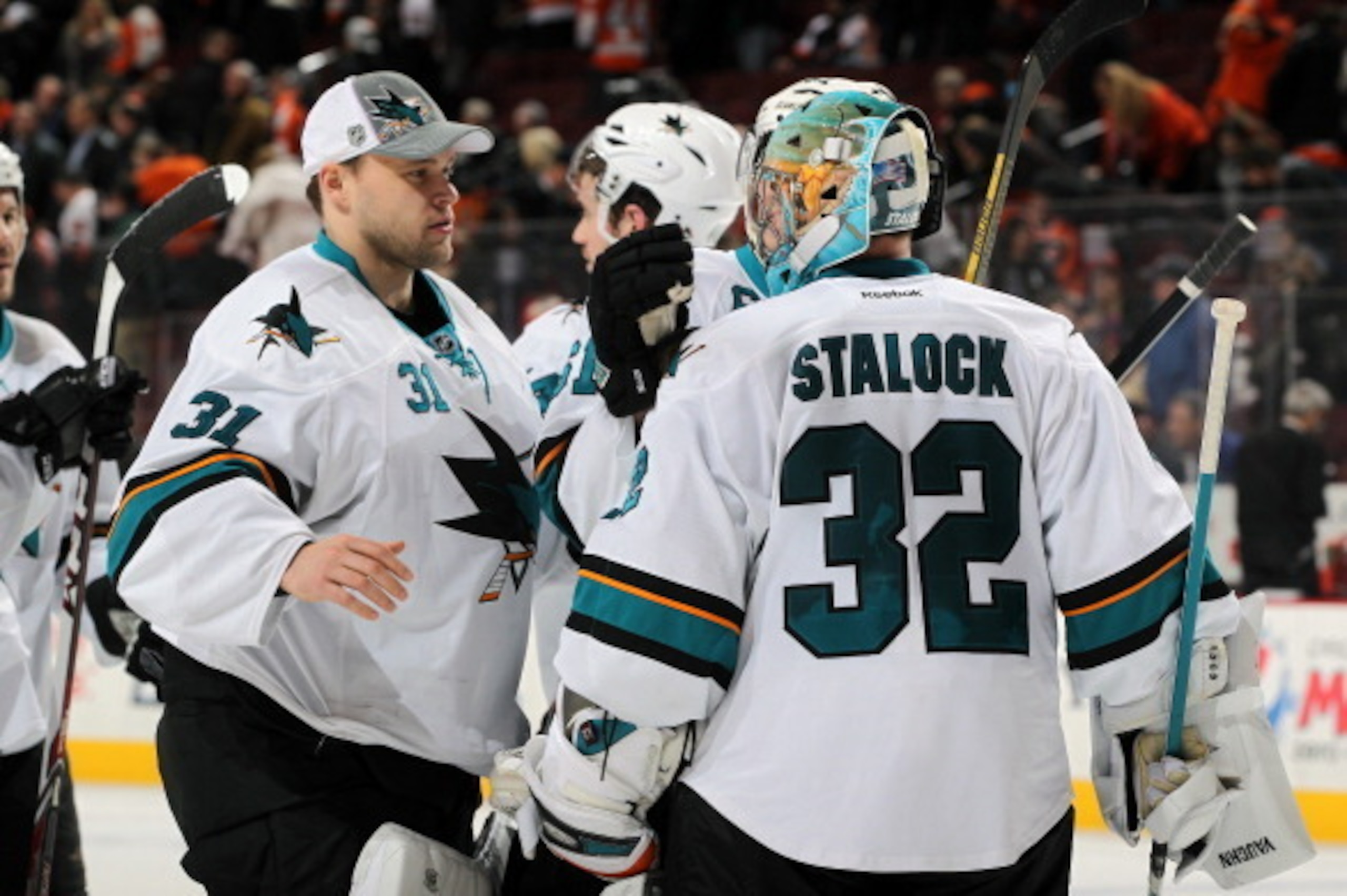 PHILADELPHIA, PA - FEBRUARY 27:  Antti Niemi #31 and Alex Stalock #32 of the San Jose Sharks celebrate after defeating the Philadelphia Flyers 7-3 on February 27, 2014 at the Wells Fargo Center in Philadelphia, Pennsylvania.  (Photo by Len Redkoles/NHLI v