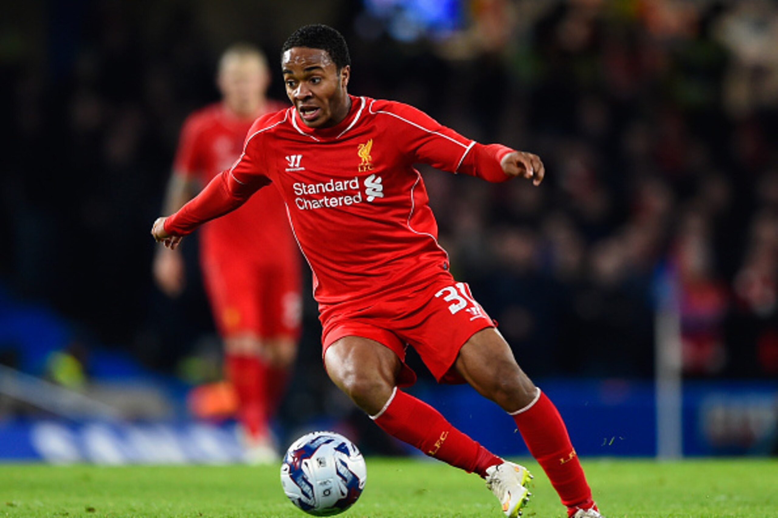 LONDON, ENGLAND - JANUARY 27:  Raheem Sterling of Liverpool on the ball during the Capital One Cup Semi-Final second leg between Chelsea and Liverpool at Stamford Bridge on January 27, 2015 in London, England.  (Photo by Mike Hewitt/Getty Images)