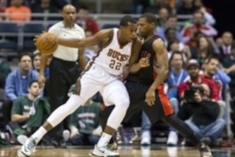 Jan 19, 2015; Milwaukee, WI, USA; Milwaukee Bucks guard Khris Middleton (22) during the first quarter against the Toronto Raptors at BMO Harris Bradley Center. Mandatory Credit: Jeff Hanisch-USA TODAY Sports