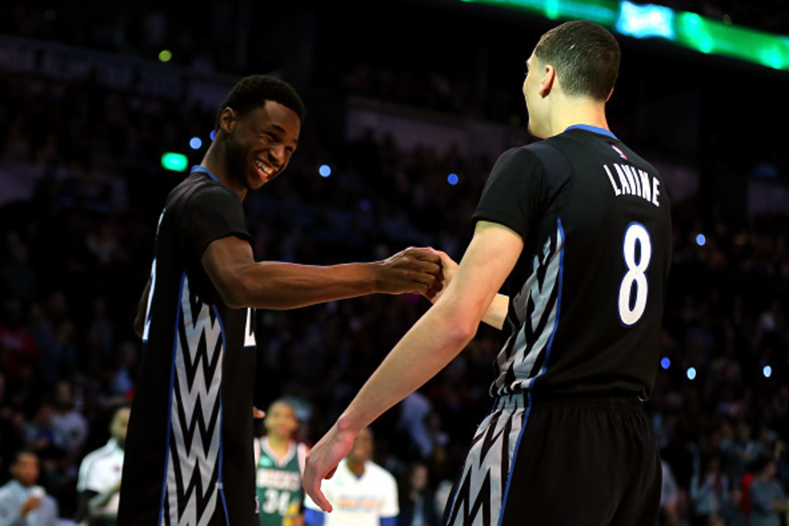 NEW YORK, NY - FEBRUARY 14:  Andrew Wiggins #22 of the Minnesota Timberwolves celebrates after a dunk by Zach LaVine #8 of the Minnesota Timberwolves during the Sprite Slam Dunk Contest as part of the 2015 NBA Allstar Weekend at Barclays Center on Februar