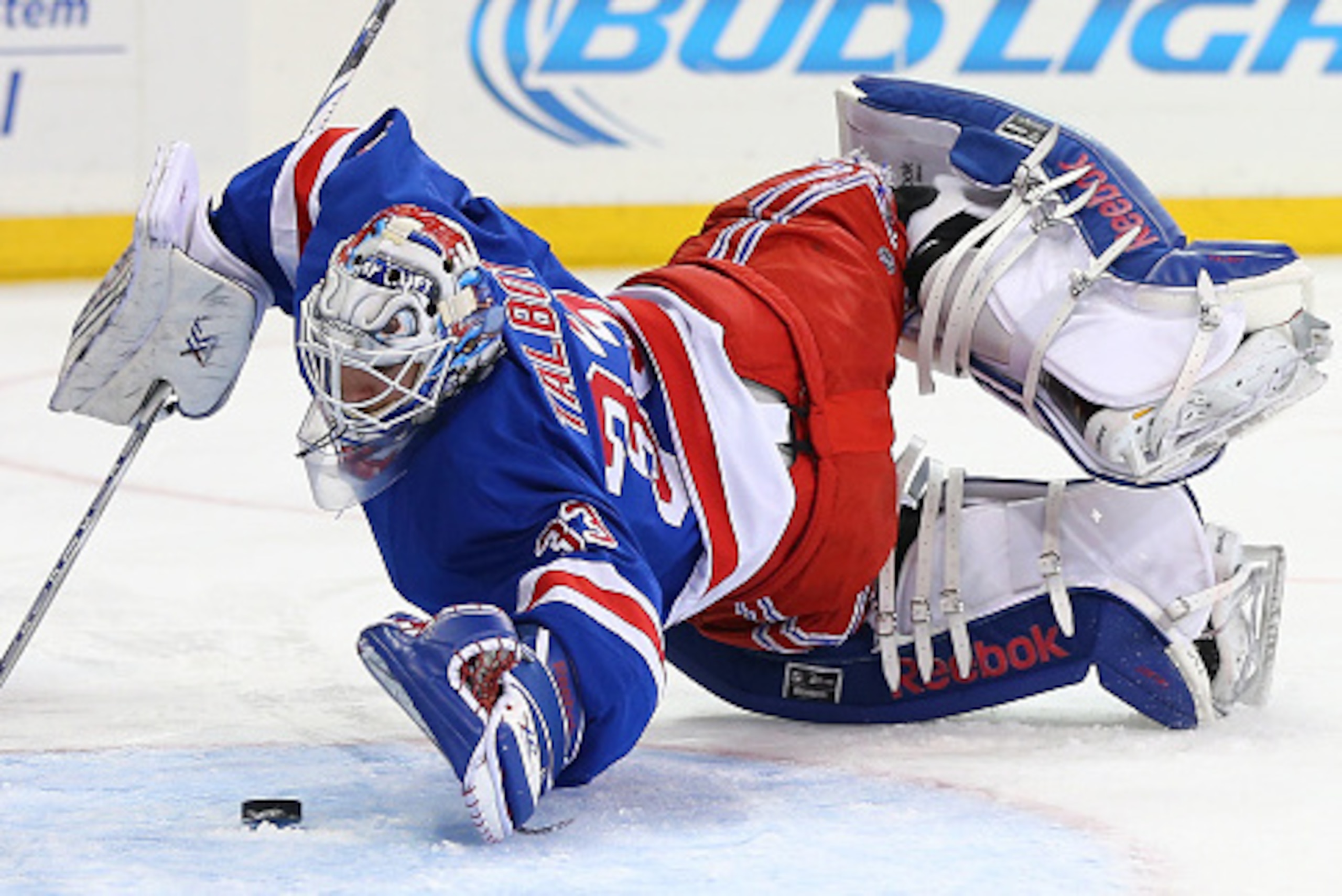NEW YORK, NY - FEBRUARY 19: Cam Talbot #33 of the New York Rangers stops a shot in the third period against the Vancouver Canucks on February 19, 2015 at Madison Square Garden in New York City.The Vancouver Canucks defeated the New York Rangers 5-4 in an NEW YORK, NY - FEBRUARY 19: Cam Talbot #33 of the New York Rangers stops a shot in the third period against the Vancouver Canucks on February 19, 2015 at Madison Square Garden in New York City.The Vancouver Canucks defeated the New York Rangers 5-4 in an