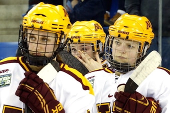 HAMDEN, CT- MARCH 23:  Members of the Minnesota Golden Gophers react after losing  the 2014 NCAA Women's Ice Hockey Championship to the Clarkson Golden Knights at TD Bank Sports Center on March 23, 2014 in Hamden, Connecticut. (Photo by Jim Rogash/Getty I