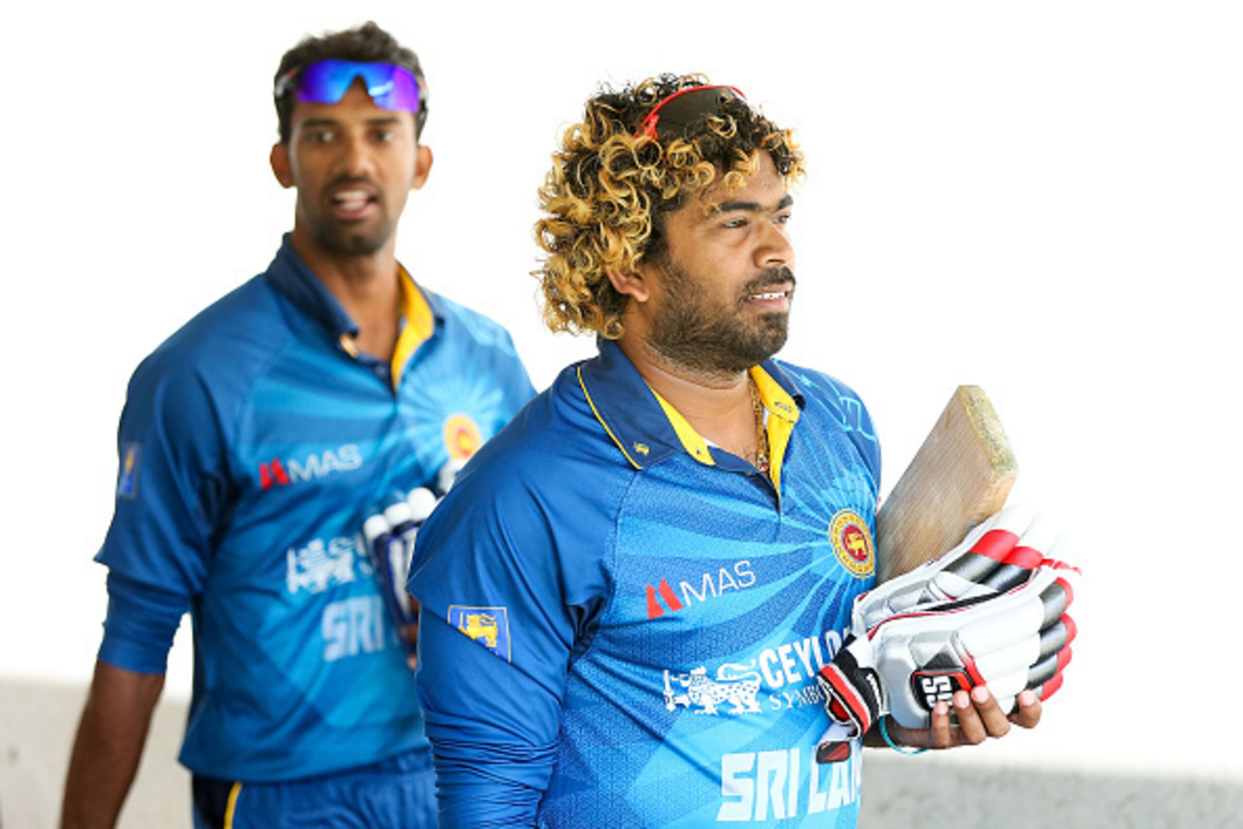 WELLINGTON, NEW ZEALAND - JANUARY 29:  Lasith Malinga (R) and Suranga Lakmal of Sri Lanka during the One Day International match between New Zealand and Sri Lanka at Westpac Stadium on January 29, 2015 in Wellington, New Zealand.  (Photo by Hagen Hopkins/