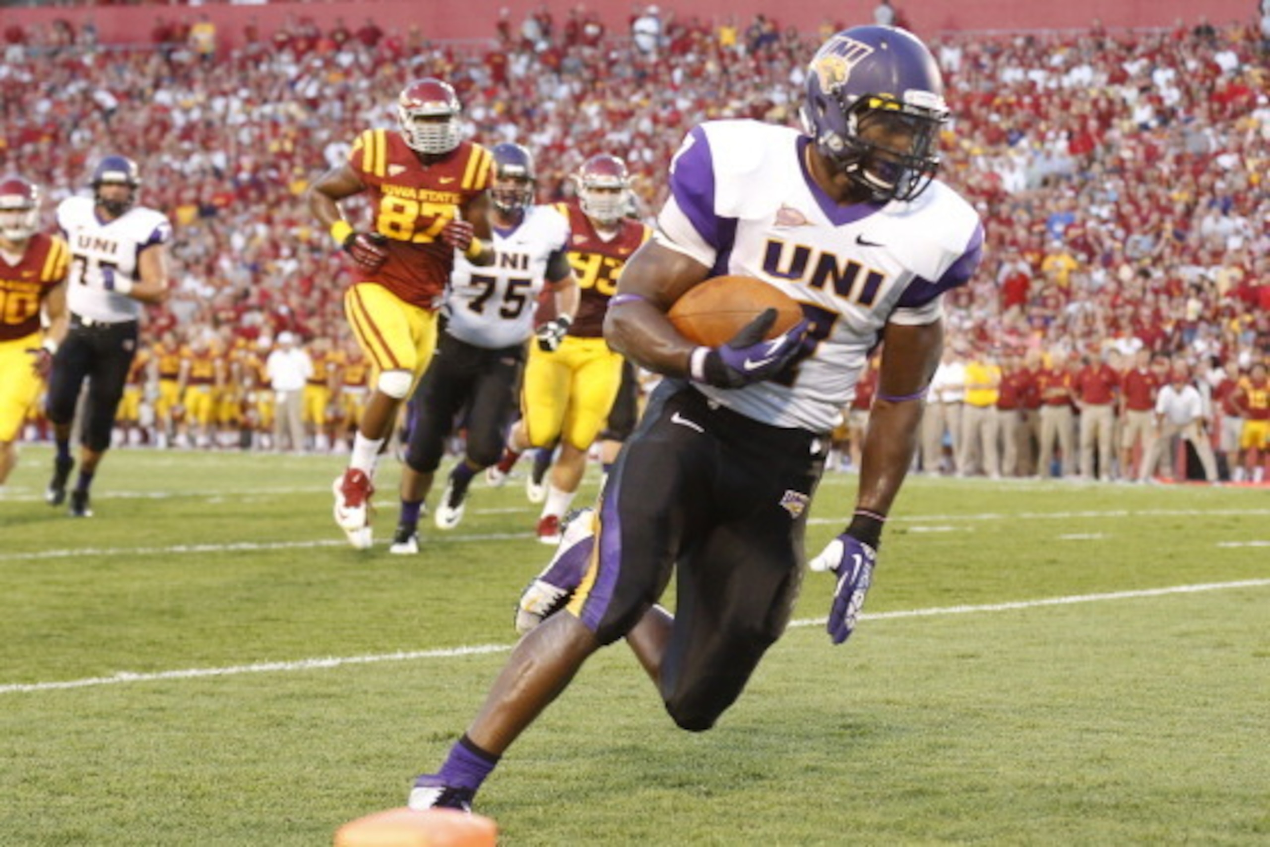 AMES, IA - AUGUST 31: Running back David Johnson #7 of the Northern Iowa Panthers drives the ball into the end zone for a touchdown again the Iowa State Cyclonesin the first half of play at Jack Trice Stadium on August 31, 2013 in Ames, Iowa. (Photo by Da