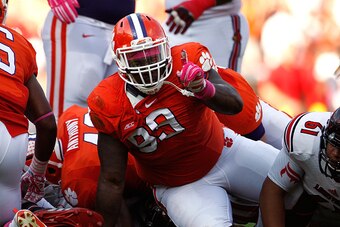 CLEMSON, SC - OCTOBER 11: Corey Crawford #93 of the Clemson Tigers reacts after making a tackle during the game against the Louisville Cardinals at Memorial Stadium on October 11, 2014 in Clemson, South Carolina. (Photo by Tyler Smith/Getty Images)