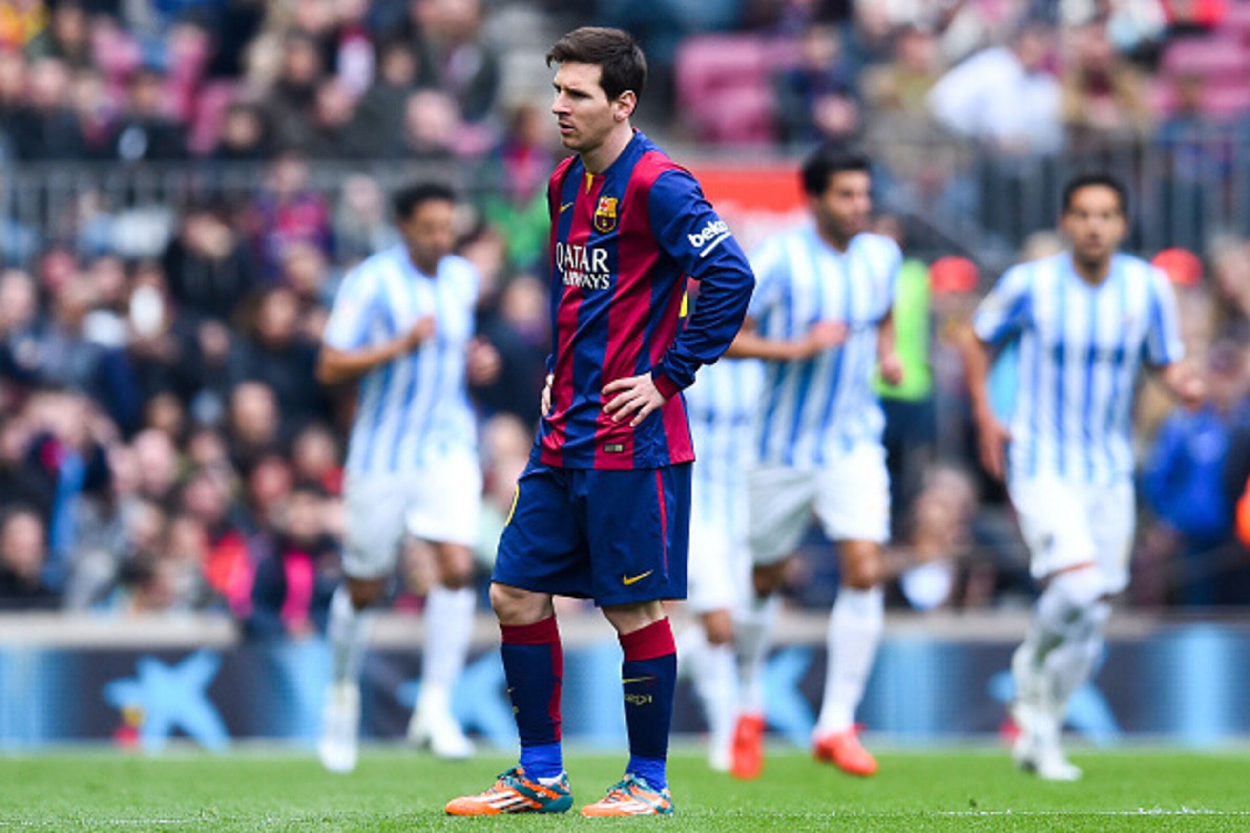 BARCELONA, SPAIN - FEBRUARY 21:  Lionel Messi of FC Barcelona looks on dejected after Juanmi Jimenez of Malaga CF scored the opening goal during the La Liga match between FC Barcelona and Malaga CF at Camp Nou on February 21, 2015 in Barcelona, Spain.  (P
