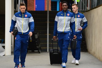 LONDON, ENGLAND - FEBRUARY 21:  Mesut Oezil, Danny Welbeck and Calum Chambers of Arsenal arrives prior to the Barclays Premier League match between Crystal Palace and Arsenal at Selhurst Park on February 21, 2015 in London, England.  (Photo by Jamie McDon