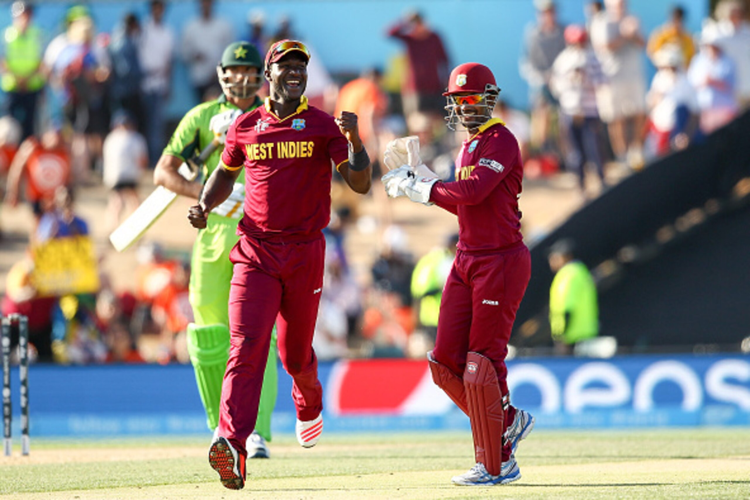 CHRISTCHURCH, NEW ZEALAND - FEBRUARY 21:  Denesh Ramdin (R) of West Indies celebrates holding a catch during the 2015 ICC Cricket World Cup match between Pakistan and the West Indies at Hagley Oval on February 21, 2015 in Christchurch, New Zealand.  (Phot