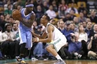 Feb 4, 2015; Boston, MA, USA; Denver Nuggets point guard Ty Lawson (3) is guarded by Boston Celtics guard Avery Bradley (0) during the fourth quarter at TD Garden.  The Boston Celtics won 104-100. Mandatory Credit: Greg M. Cooper-USA TODAY Sports