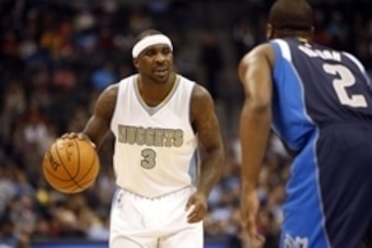 Jan 14, 2015; Denver, CO, USA; Denver Nuggets guard Ty Lawson (3) against Dallas Mavericks guard Raymond Felton (2) during the first half at Pepsi Center. Mandatory Credit: Chris Humphreys-USA TODAY Sports