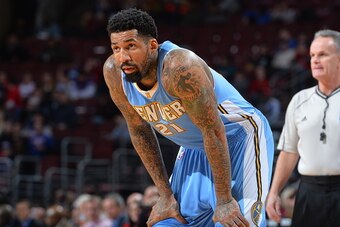 PHILADELPHIA, PA - FEBRUARY 3:  Wilson Chandler #21 of the Denver Nuggets looks on against the Philadelphia 76ers at Wells Fargo Center on February 3, 2015 in Philadelphia, Pennsylvania NOTE TO USER: User expressly acknowledges and agrees that, by downloa