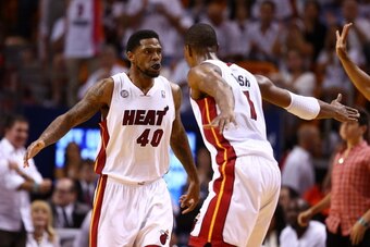 MIAMI, FL - MAY 30: Udonis Haslem #40 and Chris Bosh #1 of the Miami Heat celebrate after a play in the third quarter against the Indiana Pacers during Game Five of the Eastern Conference Finals at AmericanAirlines Arena on May 30, 2013 in Miami, Florida.