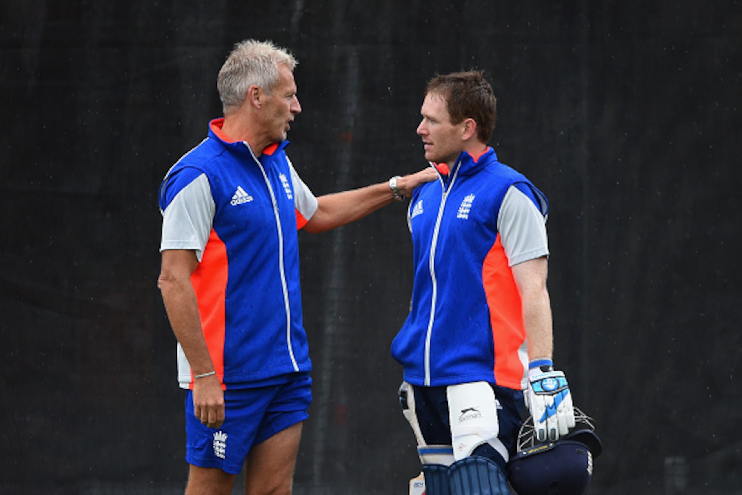 CHRISTCHURCH, NEW ZEALAND - FEBRUARY 22:  England coach Peter Moores talks with captain Eoin Morgan during an England nets session at Hagley Park Oval on February 22, 2015 in Christchurch, New Zealand.  (Photo by Shaun Botterill/Getty Images)
