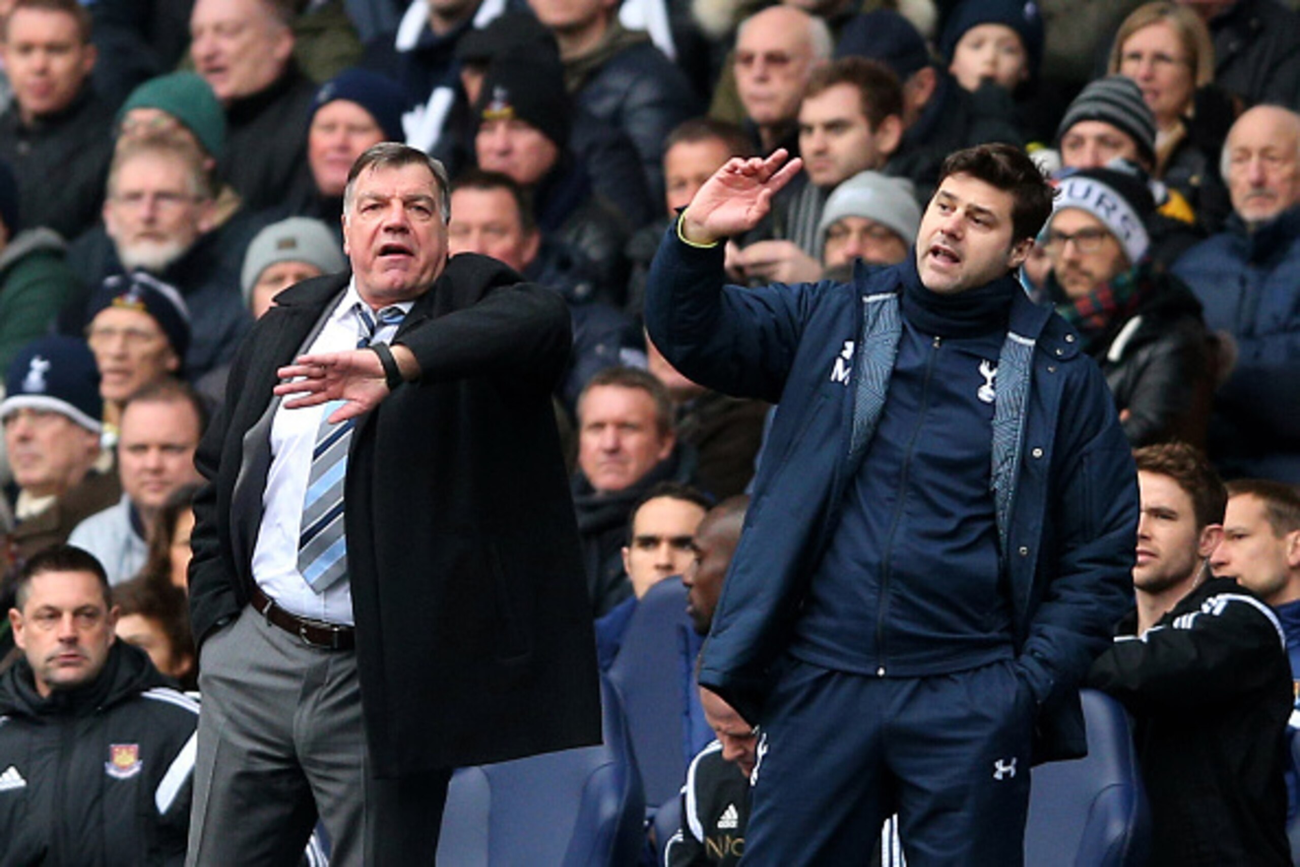 LONDON, ENGLAND - FEBRUARY 22:  (L-R) Opposing managers Sam Allardyce the manager of West Ham and Mauricio Pochettino the manager of Spurs direct their players during the Barclays Premier League match between Tottenham Hotspur and West Ham United at White