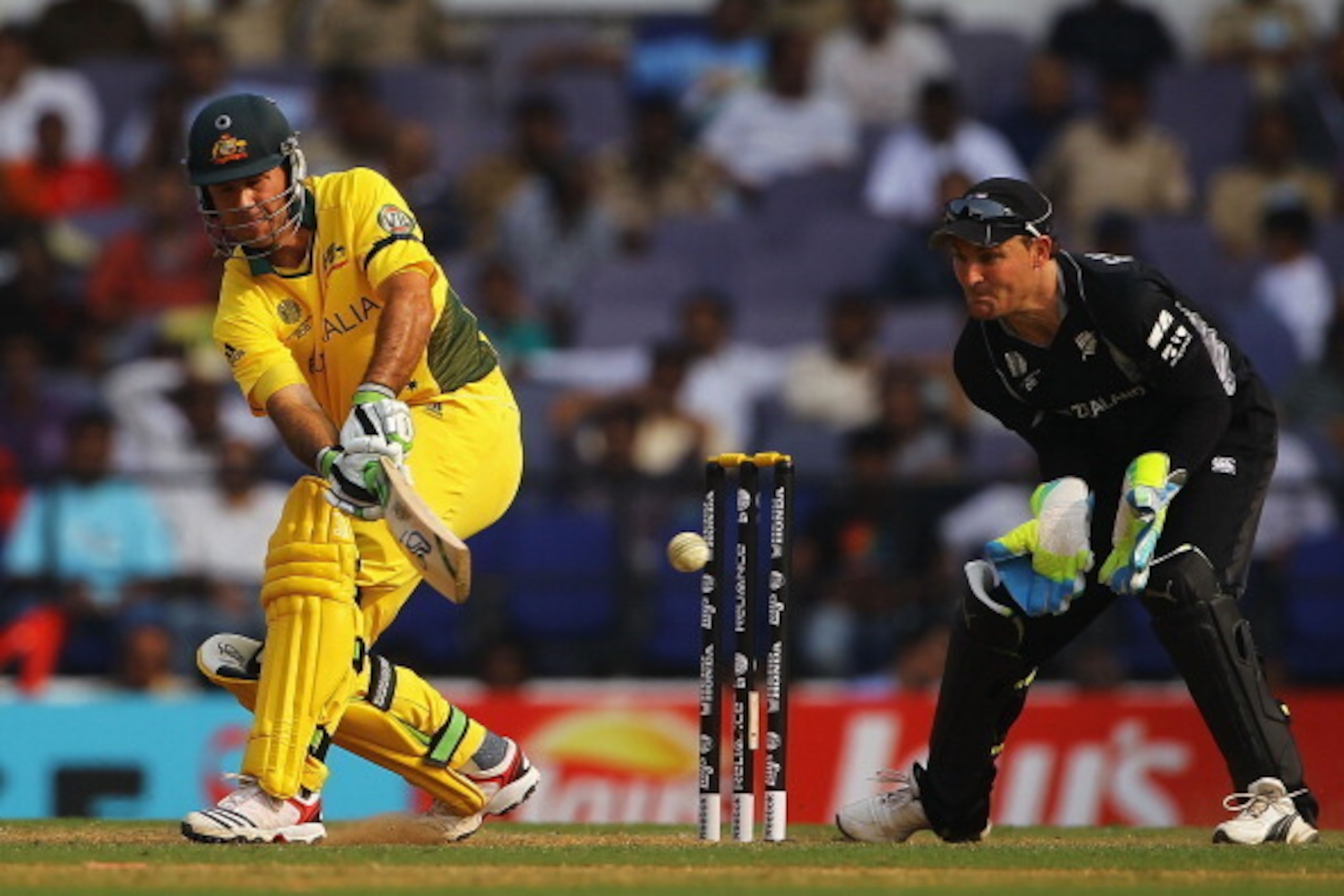 NAGPUR, INDIA - FEBRUARY 25:  Ricky Ponting of Australia pulls the ball towards the boundary, as Brendon McCullum of New Zealand looks on during the 2011 ICC World Cup Group A match between Australia and New Zealand at Vidarbha Cricket Association Ground 