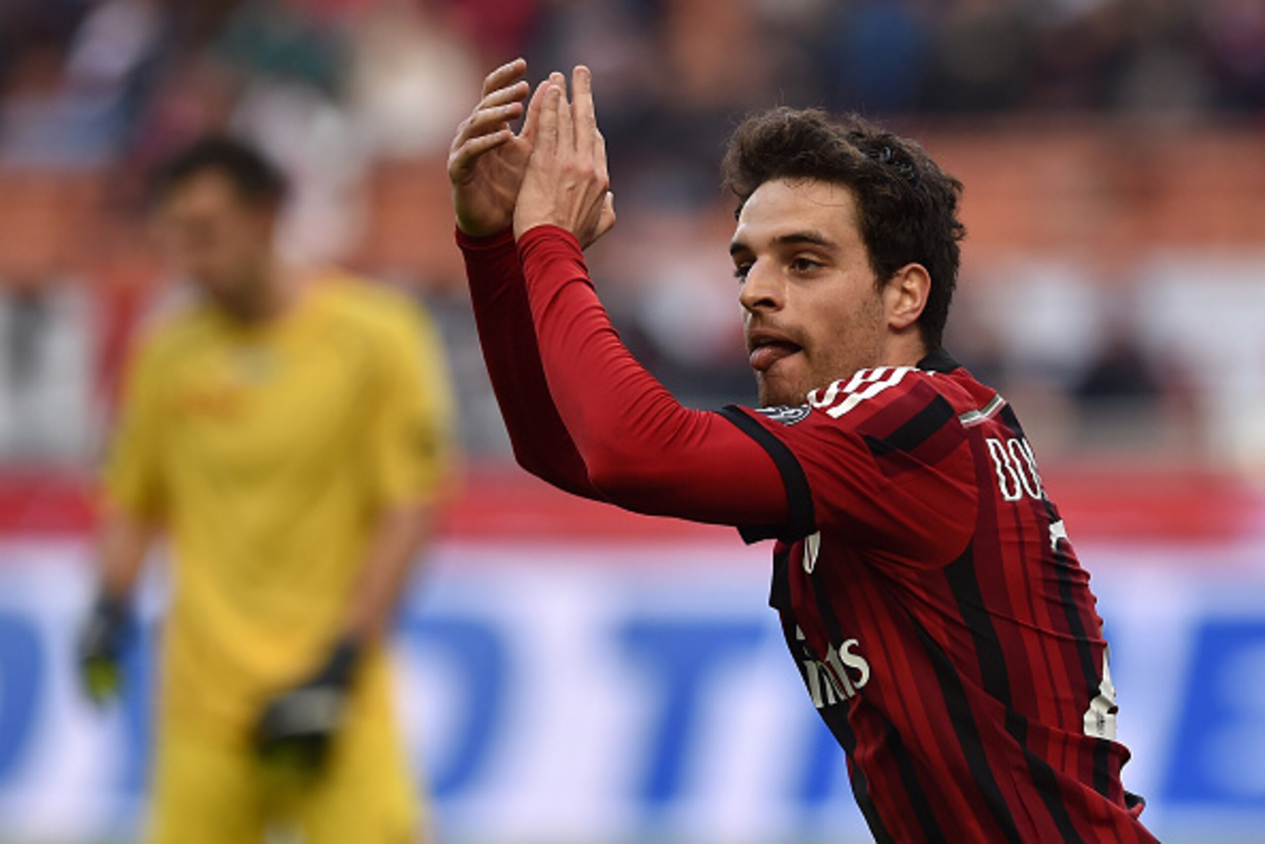 MILAN, ITALY - FEBRUARY 22:  Giacomo Bonaventura of AC Milan celebrates after scoring the opening goal during the Serie A match between AC Milan and AC Cesena at Stadio Giuseppe Meazza on February 22, 2015 in Milan, Italy.  (Photo by Valerio Pennicino/Get