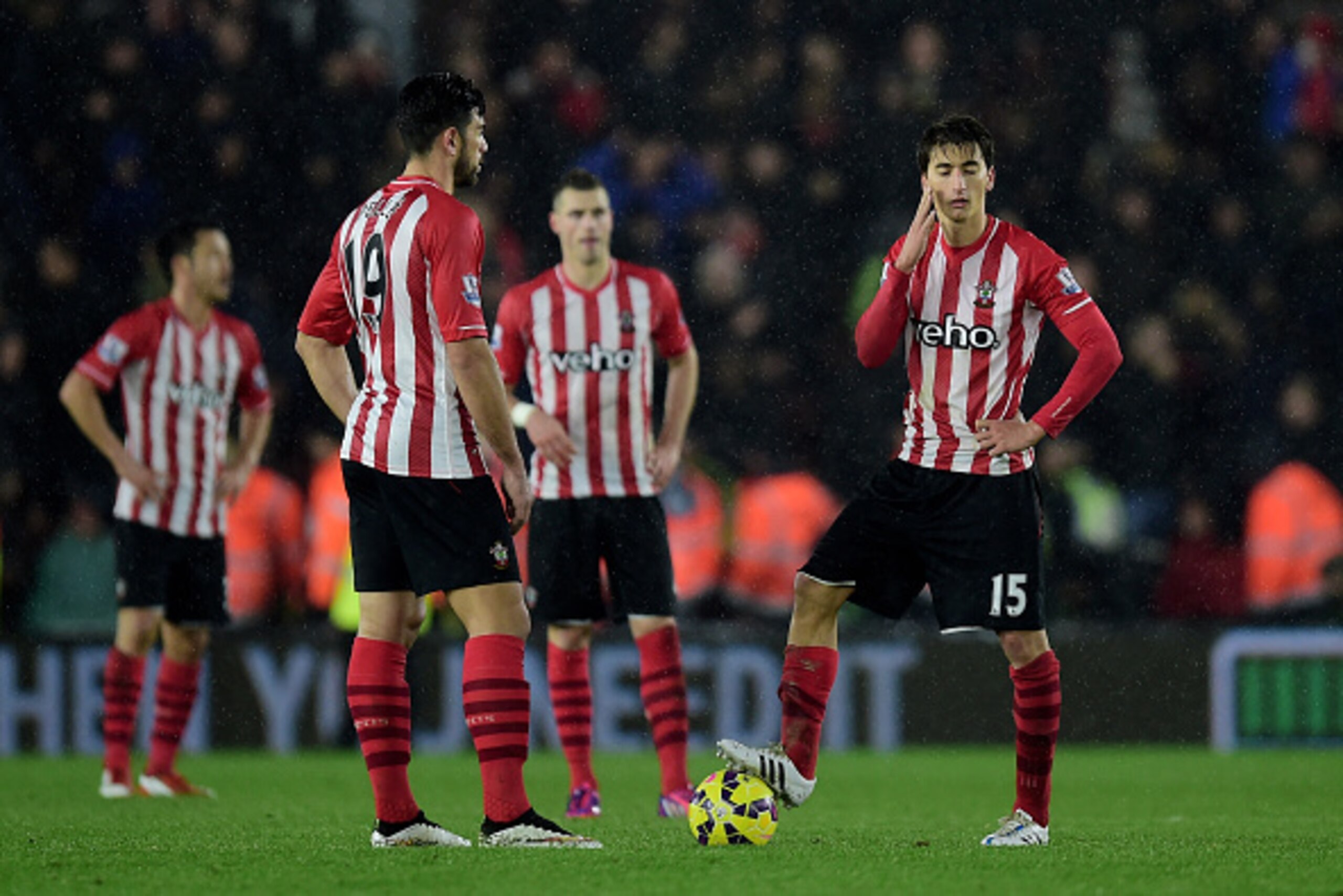 SOUTHAMPTON, ENGLAND - FEBRUARY 22: Dejected Southampton players look on after conceding a second goal during the Barclays Premier League match between Southampton and Liverpool at St Mary's Stadium on February 22, 2015 in Southampton, England. (Photo b SOUTHAMPTON, ENGLAND - FEBRUARY 22: Dejected Southampton players look on after conceding a second goal during the Barclays Premier League match between Southampton and Liverpool at St Mary's Stadium on February 22, 2015 in Southampton, England. (Photo b