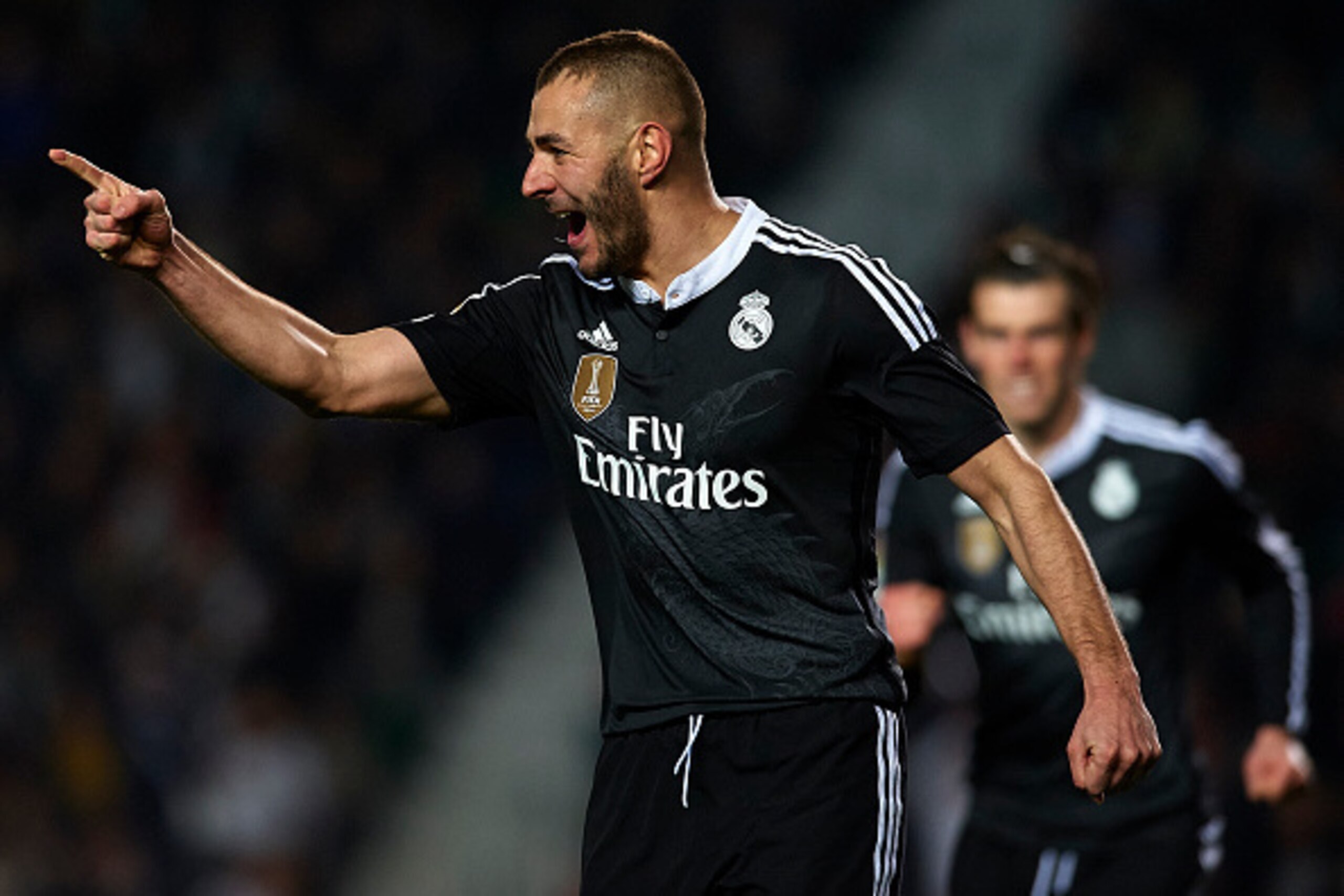 ELCHE, SPAIN - FEBRUARY 22:  Karim Benzema of Real Madrid celebrates after scoring during the La Liga match between Elche FC and Real Madrid at Estadio Manuel Martinez Valero on February 22, 2015 in Elche, Spain.  (Photo by Manuel Queimadelos Alonso/Getty
