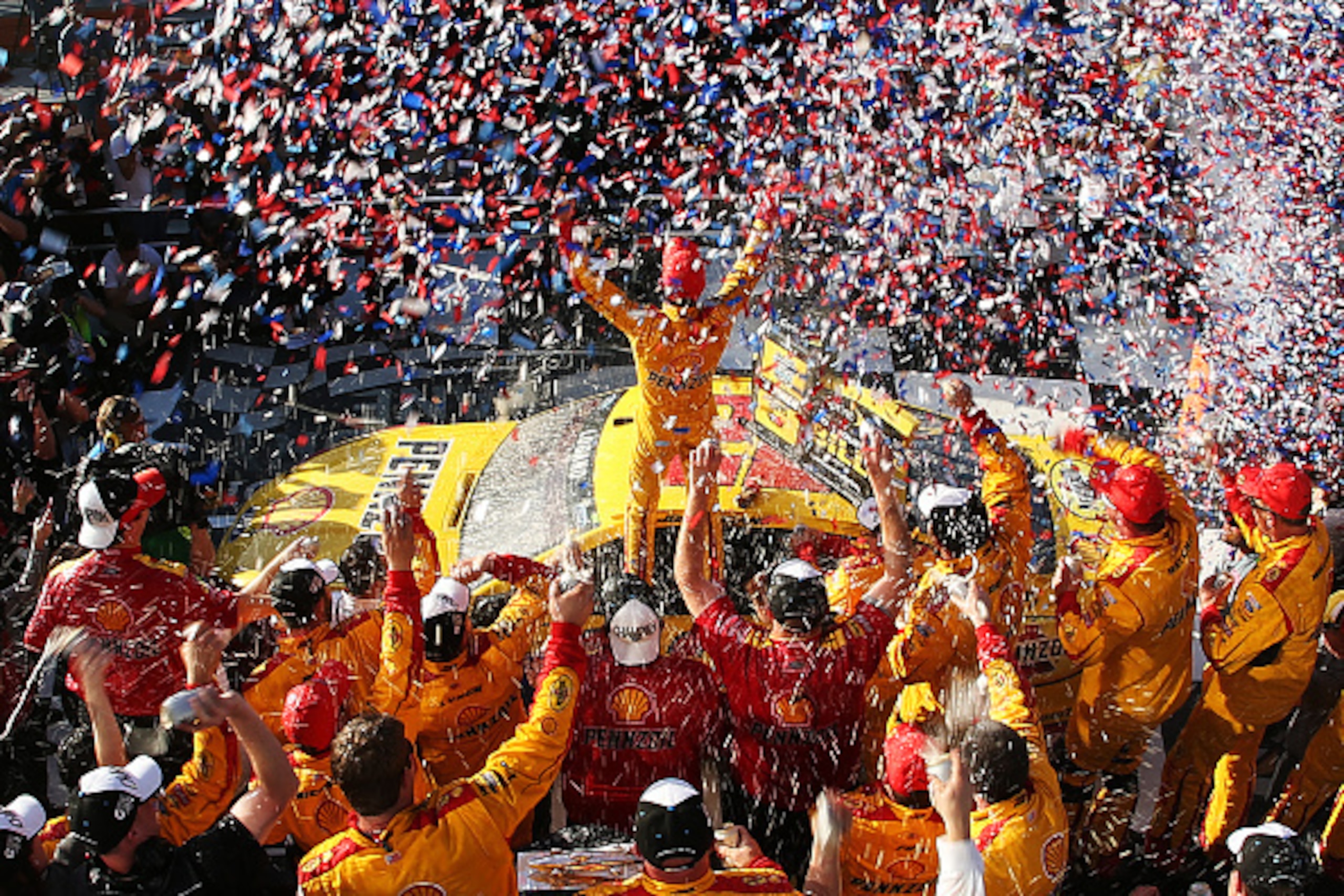 DAYTONA BEACH, FL - FEBRUARY 22:  Joey Logano, driver of the #22 Shell Pennzoil Ford, celebrates in victory lane after winning the NASCAR Sprint Cup Series 57th Annual Daytona 500 at Daytona International Speedway on February 22, 2015 in Daytona Beach, Fl