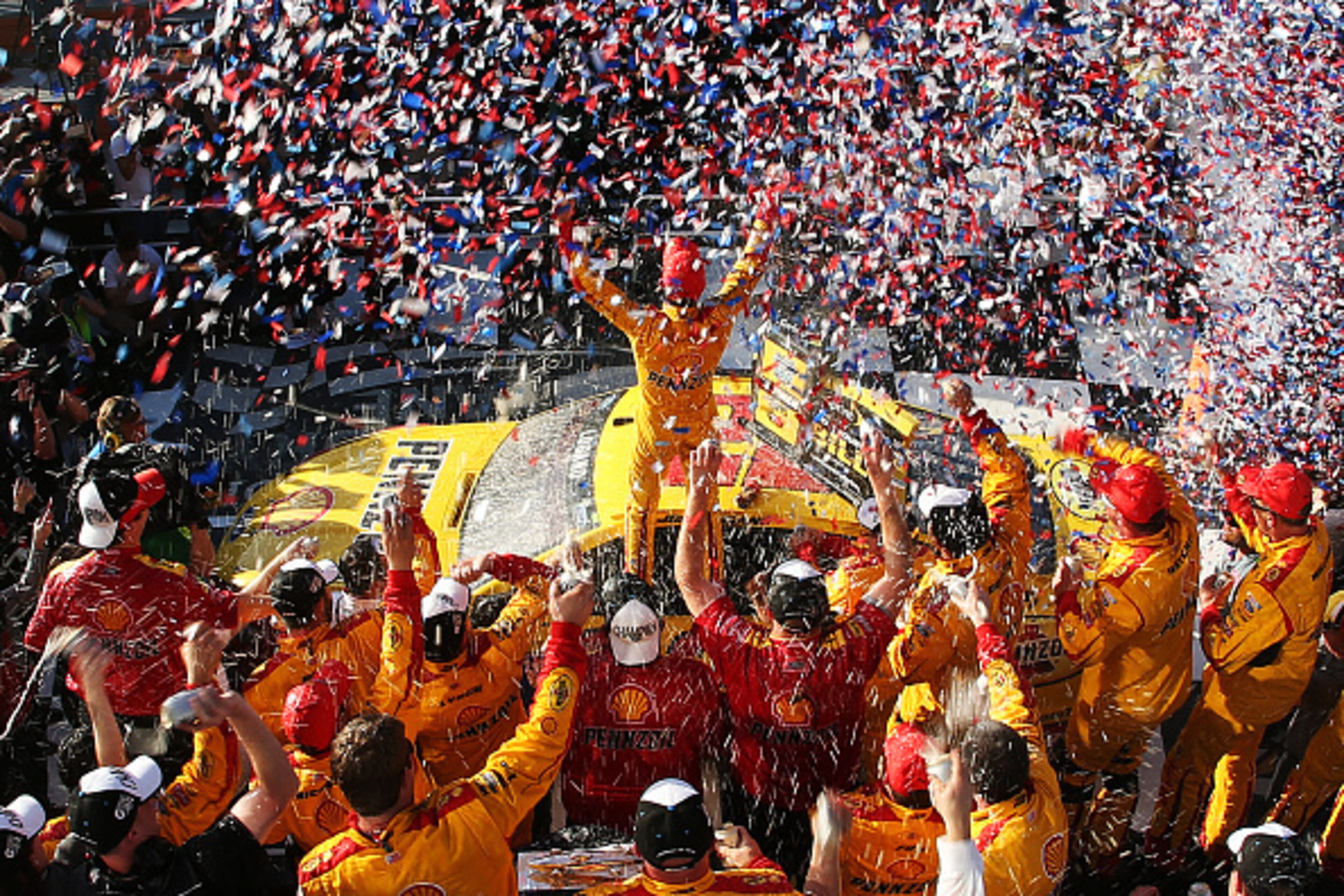 DAYTONA BEACH, FL - FEBRUARY 22:  Joey Logano, driver of the #22 Shell Pennzoil Ford, celebrates in victory lane after winning the NASCAR Sprint Cup Series 57th Annual Daytona 500 at Daytona International Speedway on February 22, 2015 in Daytona Beach, Fl