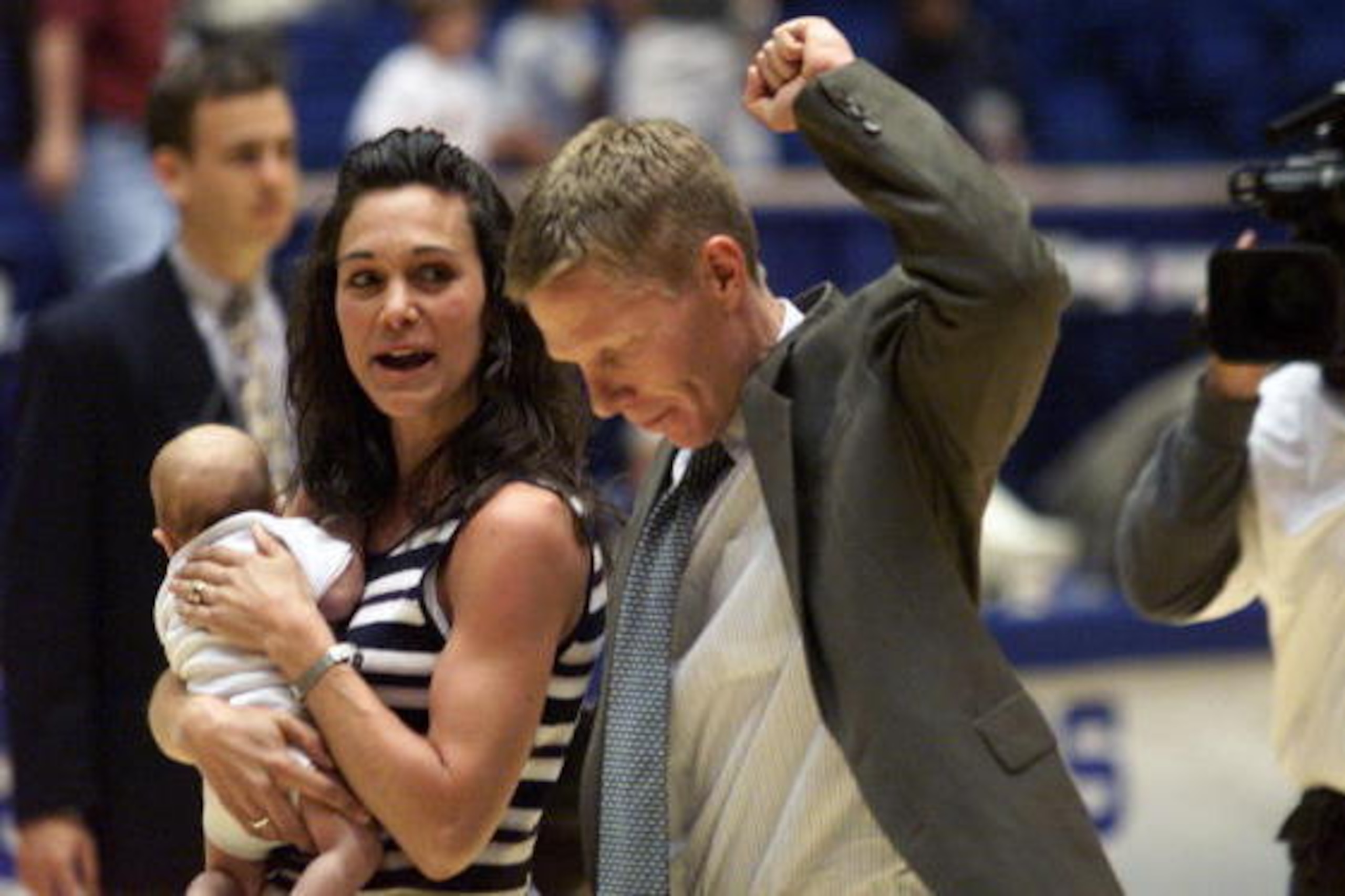 18 Mar 2000: Head Coach of Gonzaga Mark Few walks off the court with his wife Marcy and baby A.J. after the second round win over St. John''s at the Western Regional NCAA basketball tournament at the McKale Center in Tucson, Arizona. DIGITAL IMAGE.