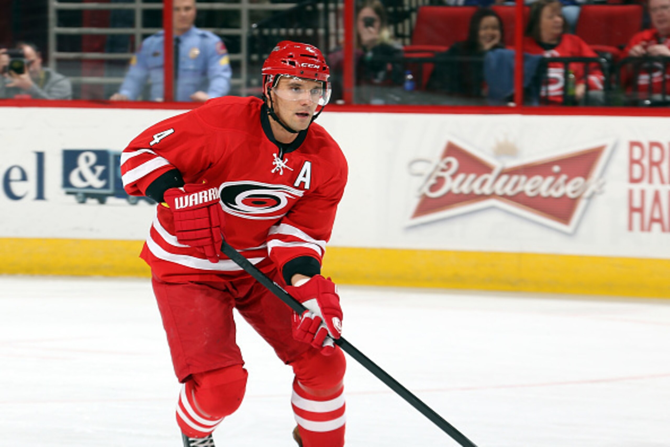 RALEIGH, NC - FEBRUARY 20: Andrej Sekera #4 of the Carolina Hurricanes carries the puck during an NHL game against the Toronto Maple Leafs at PNC Arena on Febuary 20, 2015 in Raleigh, North Carolina.  (Photo by Gregg Forwerck/NHLI via Getty Images)