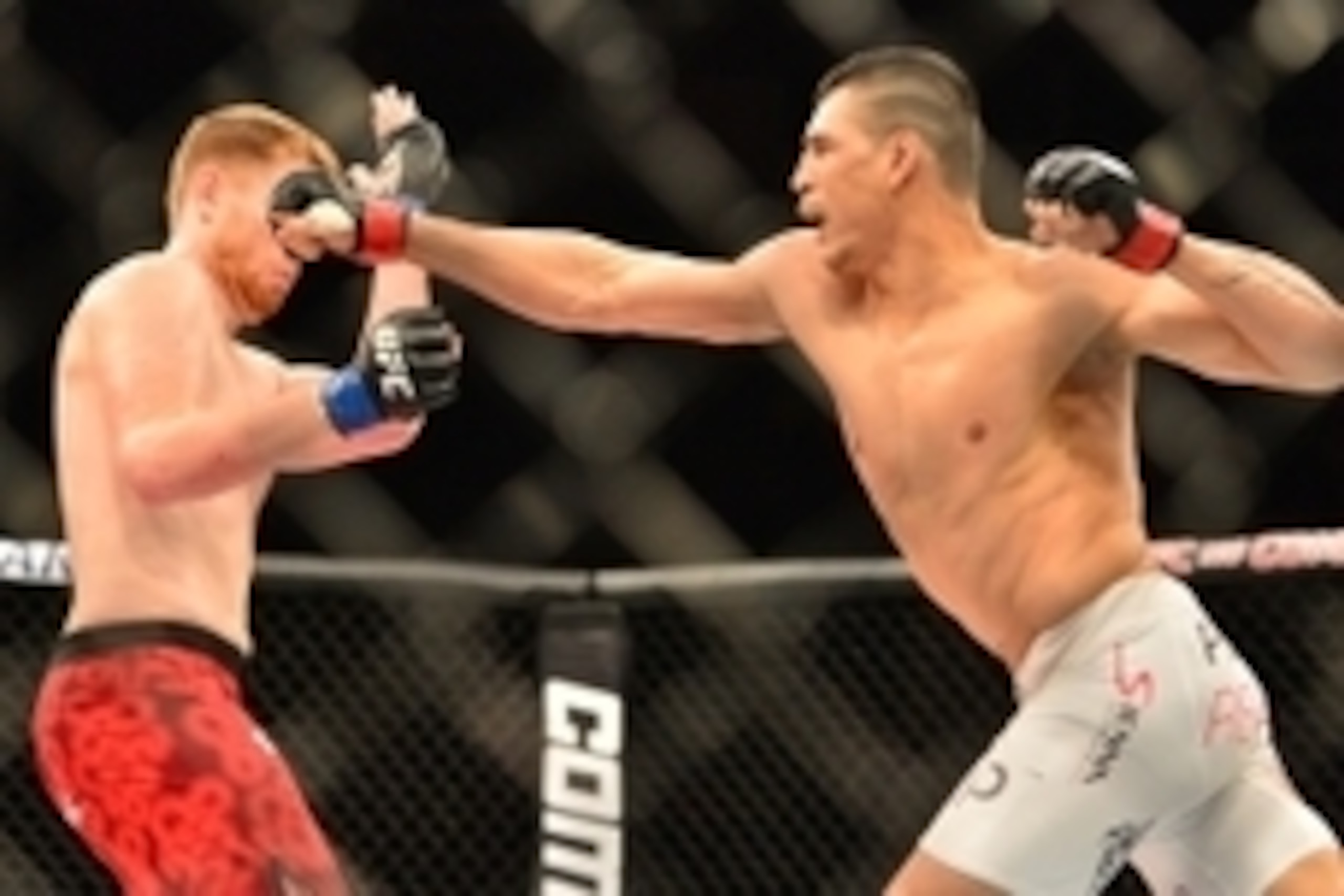 Feb 22, 2015; Porto Alegre, Brazil; Sam Alvey (blue gloves) fights against Cezar Ferreira (red gloves) during UFC Fight Night at Ginasio do Gigantinho. Mandatory Credit: Jason da Silva-USA TODAY Sports
