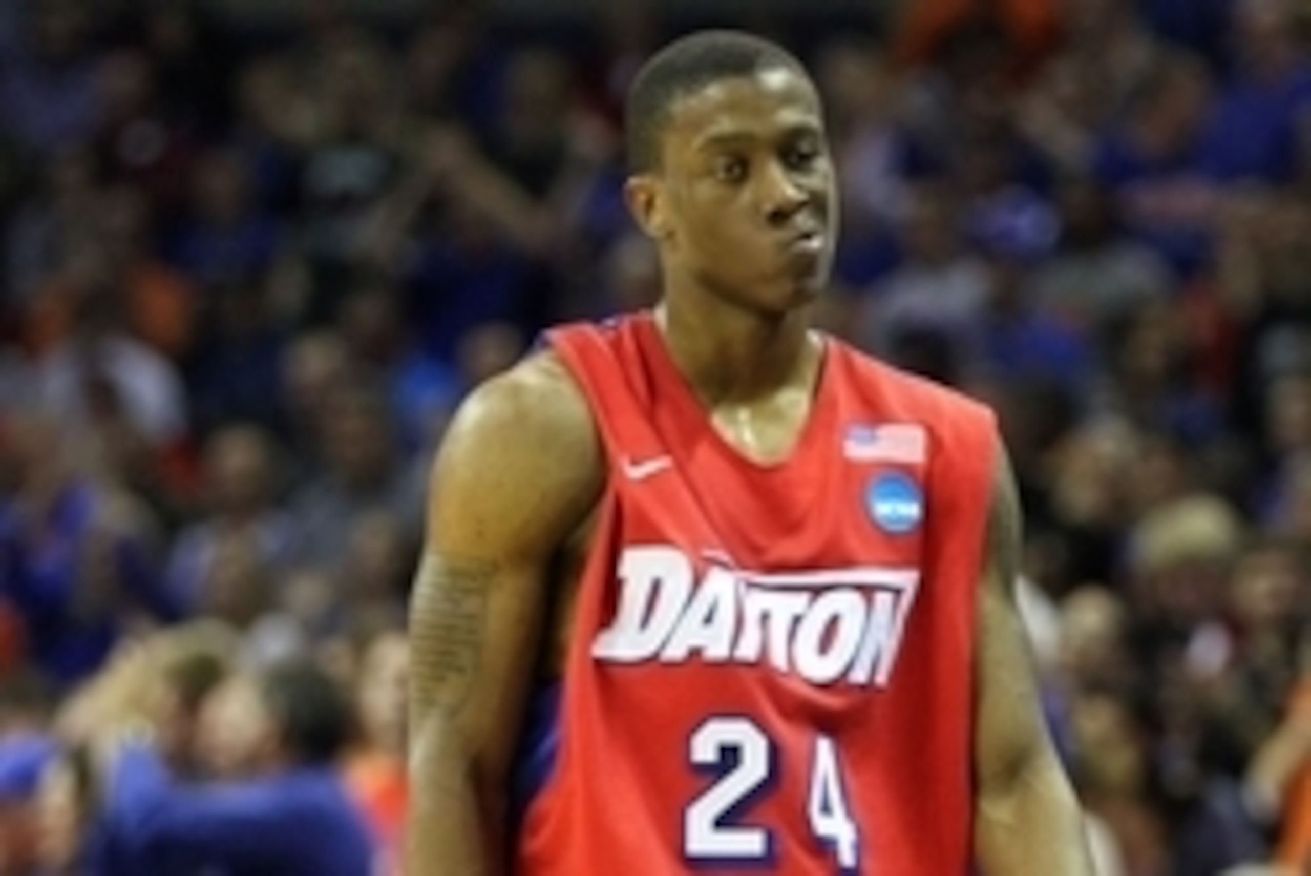 Mar 29, 2014; Memphis, TN, USA; Dayton Flyers guard Jordan Sibert (24) reacts during the second half in the finals of the south regional of the 2014 NCAA Mens Basketball Championship tournament against the Florida Gators at FedEx Forum. Florida won 62-52.