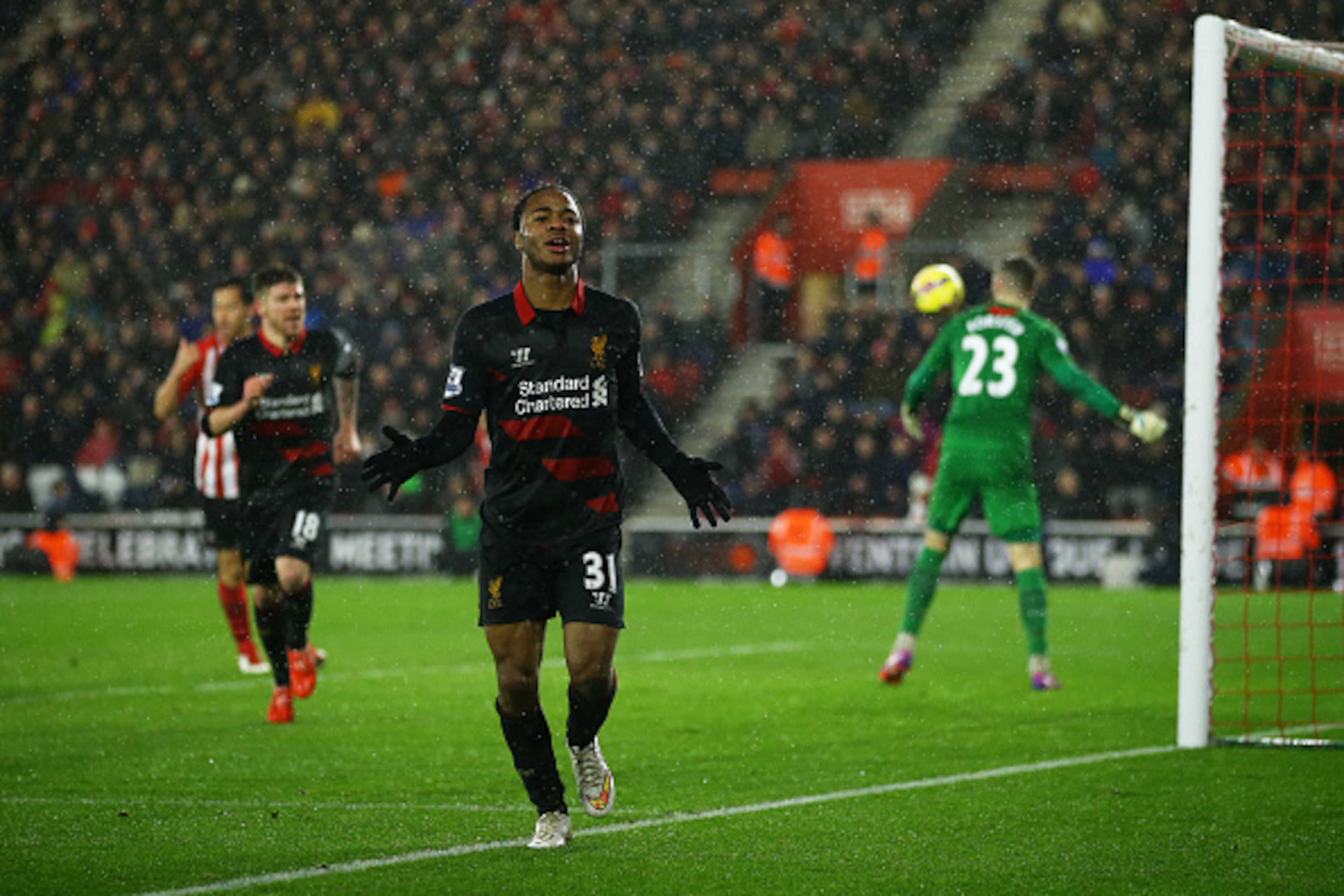 SOUTHAMPTON, ENGLAND - FEBRUARY 22:  Raheem Sterling of Liverpool celebrates after scoring his team's second goal during the Barclays Premier League match between Southampton and Liverpool at St Mary's Stadium on February 22, 2015 in Southampton, England.
