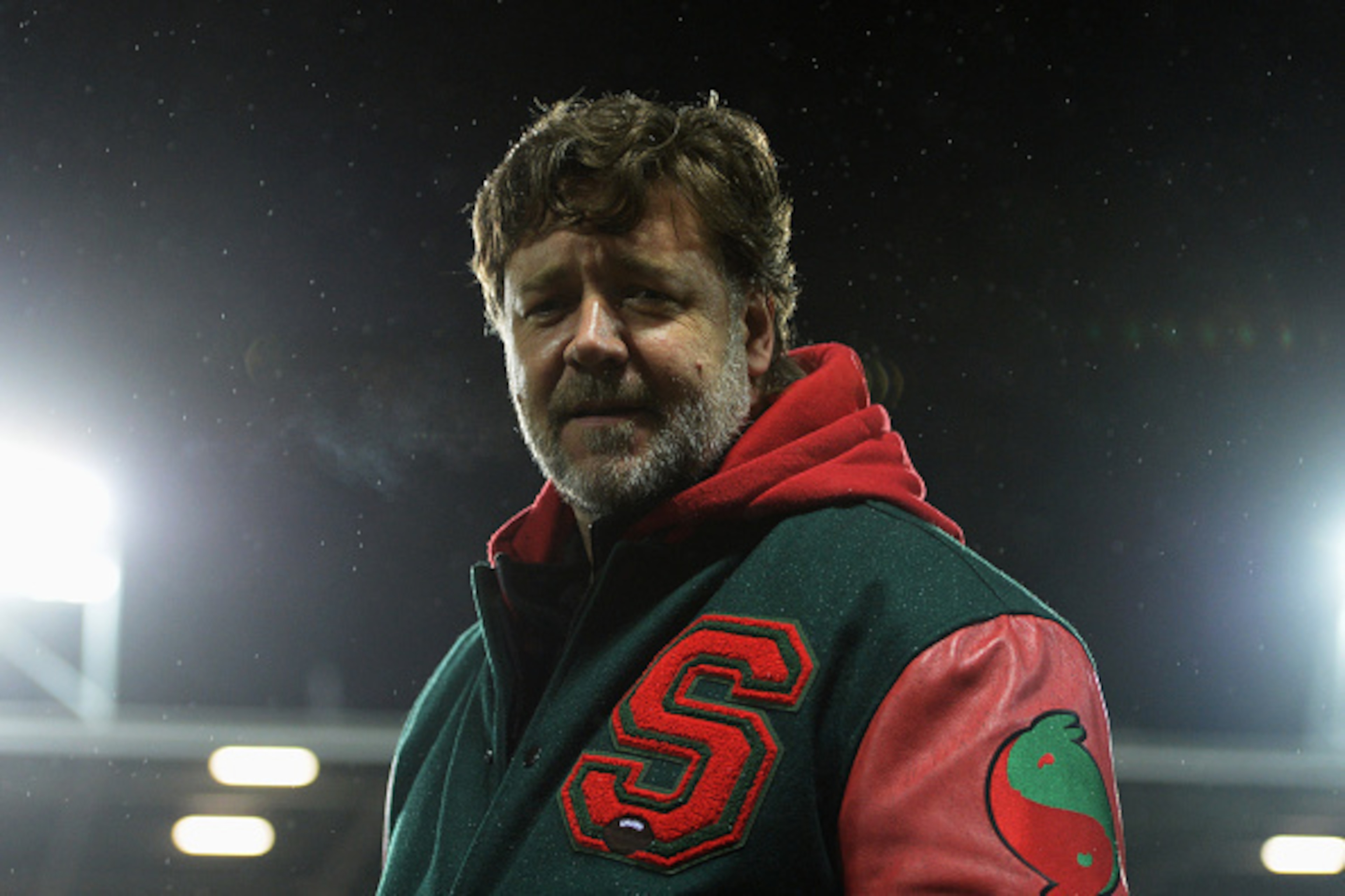 ST HELENS, ENGLAND - FEBRUARY 22:  Actor and co-owner of South Sydney Rabbitohs Russell Crowe looks on prior to the World Club Challenge match between St Helens and South Sydney Rabbitohs at Langtree Park on February 22, 2015 in St Helens, England. The ma