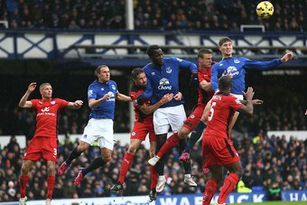 LIVERPOOL, ENGLAND - FEBRUARY 22:  L-R Phil Jagielka,Romelu Lukaku and John Stones of Everton in goalmouth action during the Barclays Premier League match between Everton and Leicester City at Goodison Park on February 22, 2015 in Liverpool, England.  (Ph