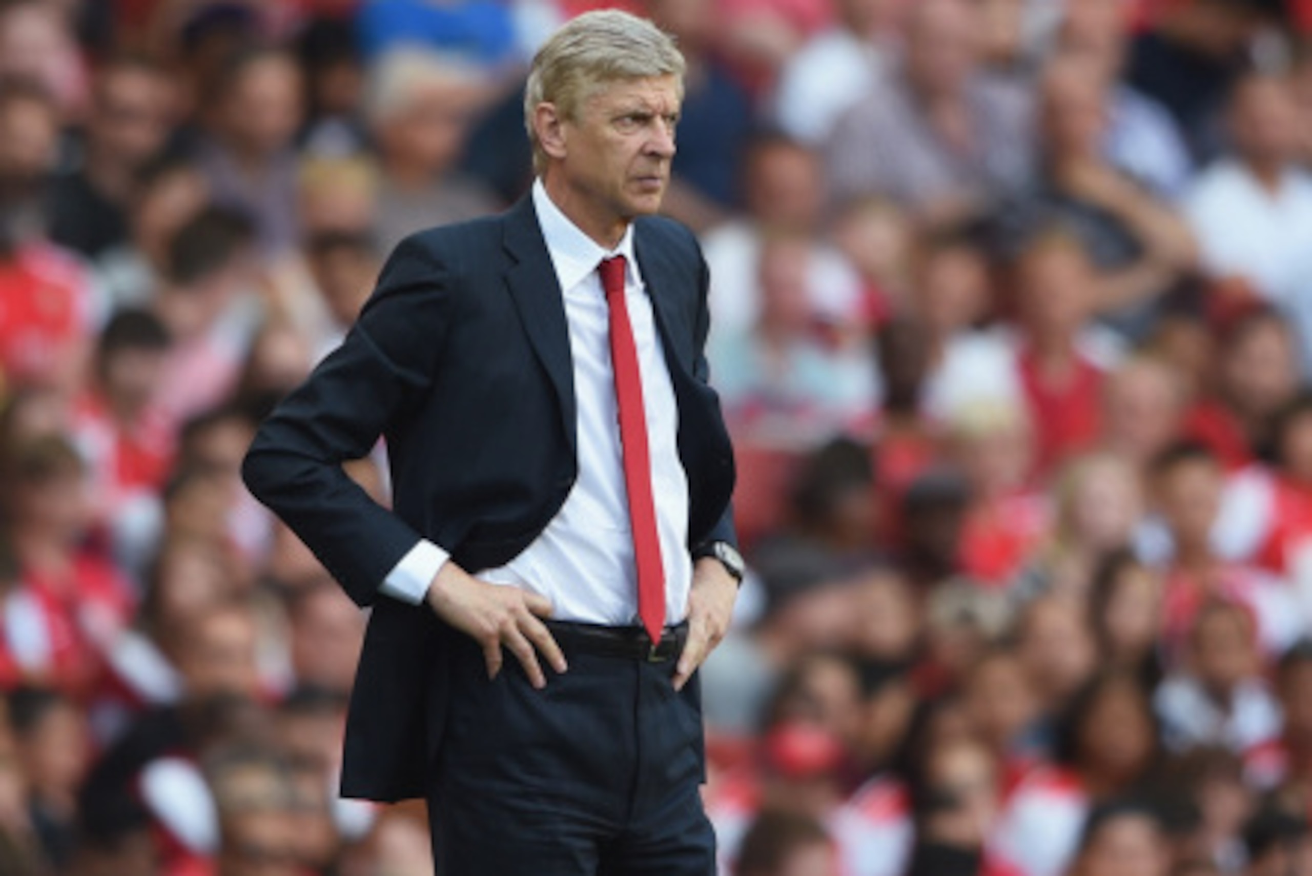 LONDON, ENGLAND - AUGUST 03: Arsenal manager Arsene Wenger looks on during the Emirates Cup match between Arsenal and AS Monaco at the Emirates Stadium on August 3, 2014 in London, England. (Photo by Michael Regan/Getty Images) LONDON, ENGLAND - AUGUST 03: Arsenal manager Arsene Wenger looks on during the Emirates Cup match between Arsenal and AS Monaco at the Emirates Stadium on August 3, 2014 in London, England. (Photo by Michael Regan/Getty Images)