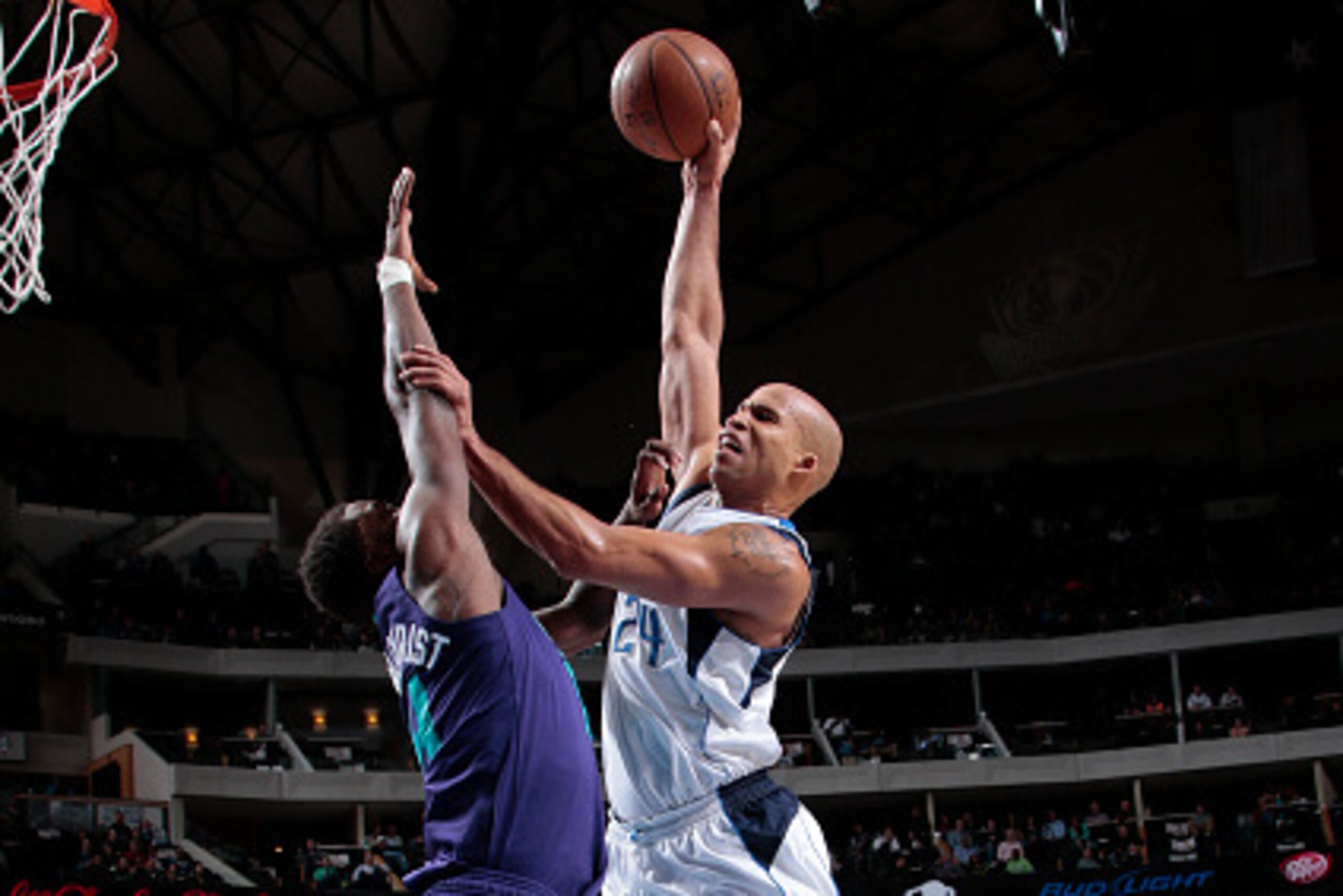 DALLAS, TX - FEBRUARY 22: Richard Jefferson #24 of the Dallas Mavericks goes in for the dunk against Michael Kidd-Gilchrist #14 of the Charlotte Hornets on February 22, 2015 at the American Airlines Center in Dallas, Texas. NOTE TO USER: User expressly ac