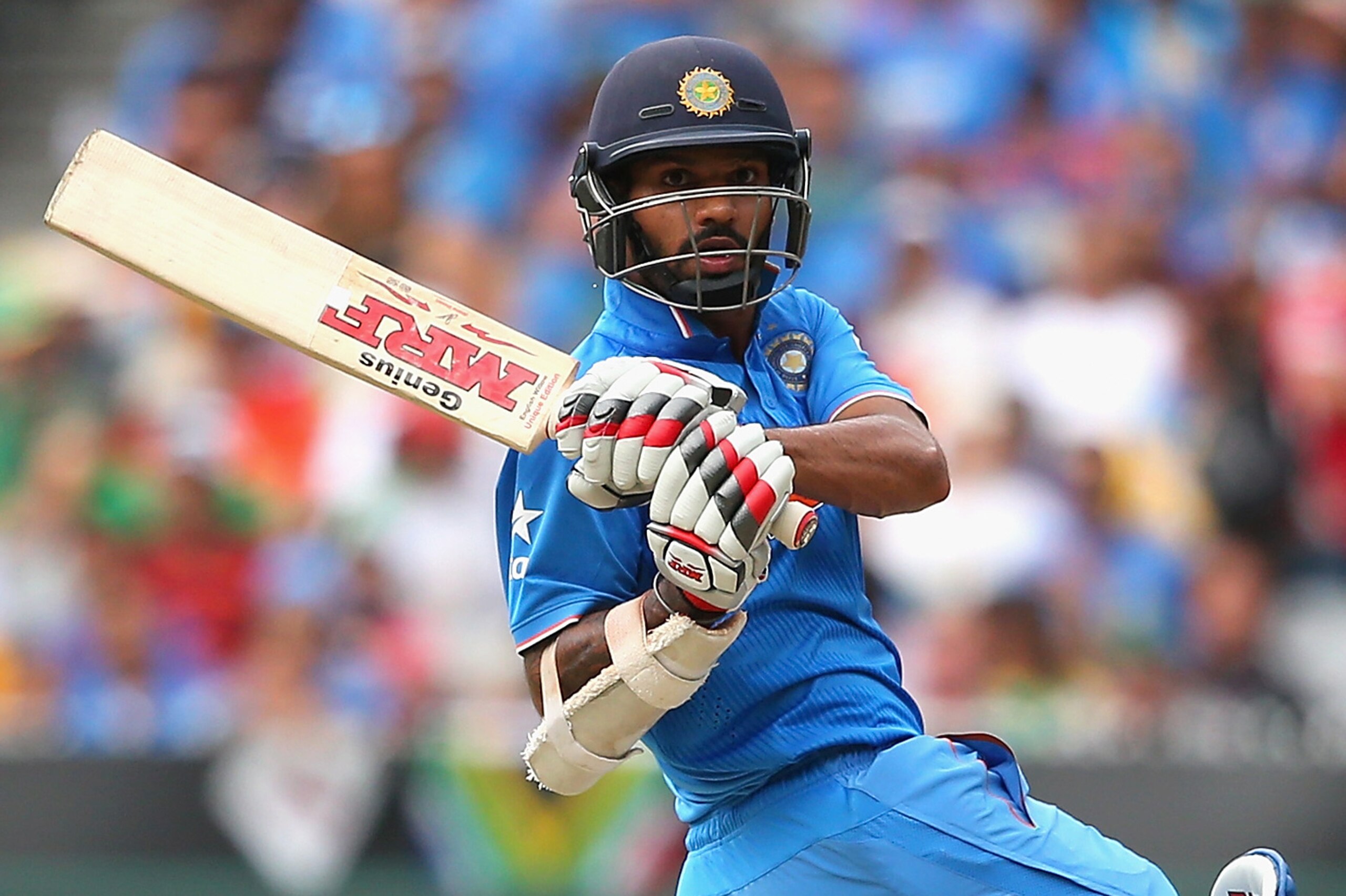 MELBOURNE, AUSTRALIA - FEBRUARY 22:  Shikhar Dhawan of India bats during the 2015 ICC Cricket World Cup match between South Africa and India at Melbourne Cricket Ground on February 22, 2015 in Melbourne, Australia.  (Photo by Quinn Rooney/Getty Images)
