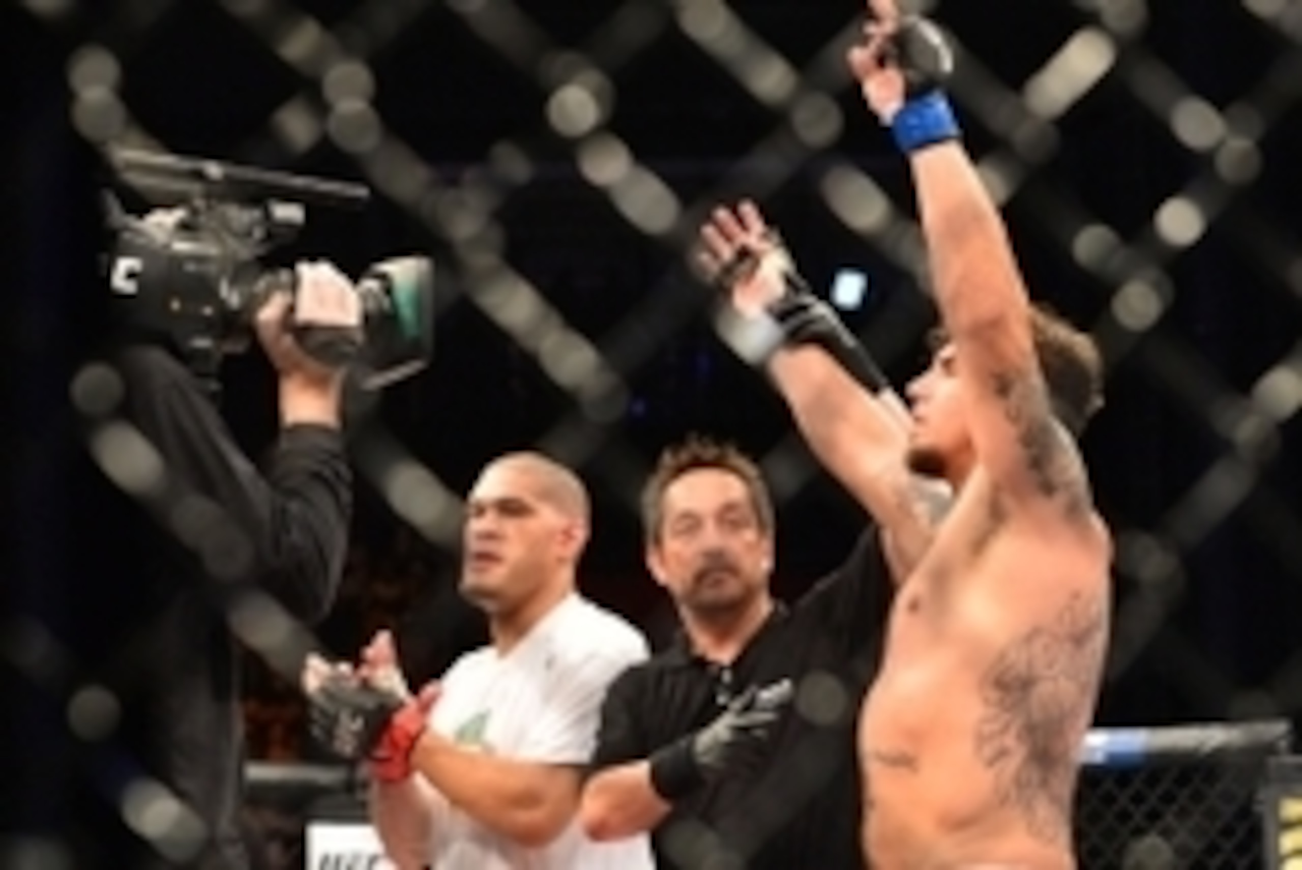 Feb 22, 2015; Porto Alegre, Brazil; Frank Mir (blue gloves) after defeating Antonio Silva during UFC Fight Night at Ginasio do Gigantinho. Mandatory Credit: Jason da Silva-USA TODAY Sports