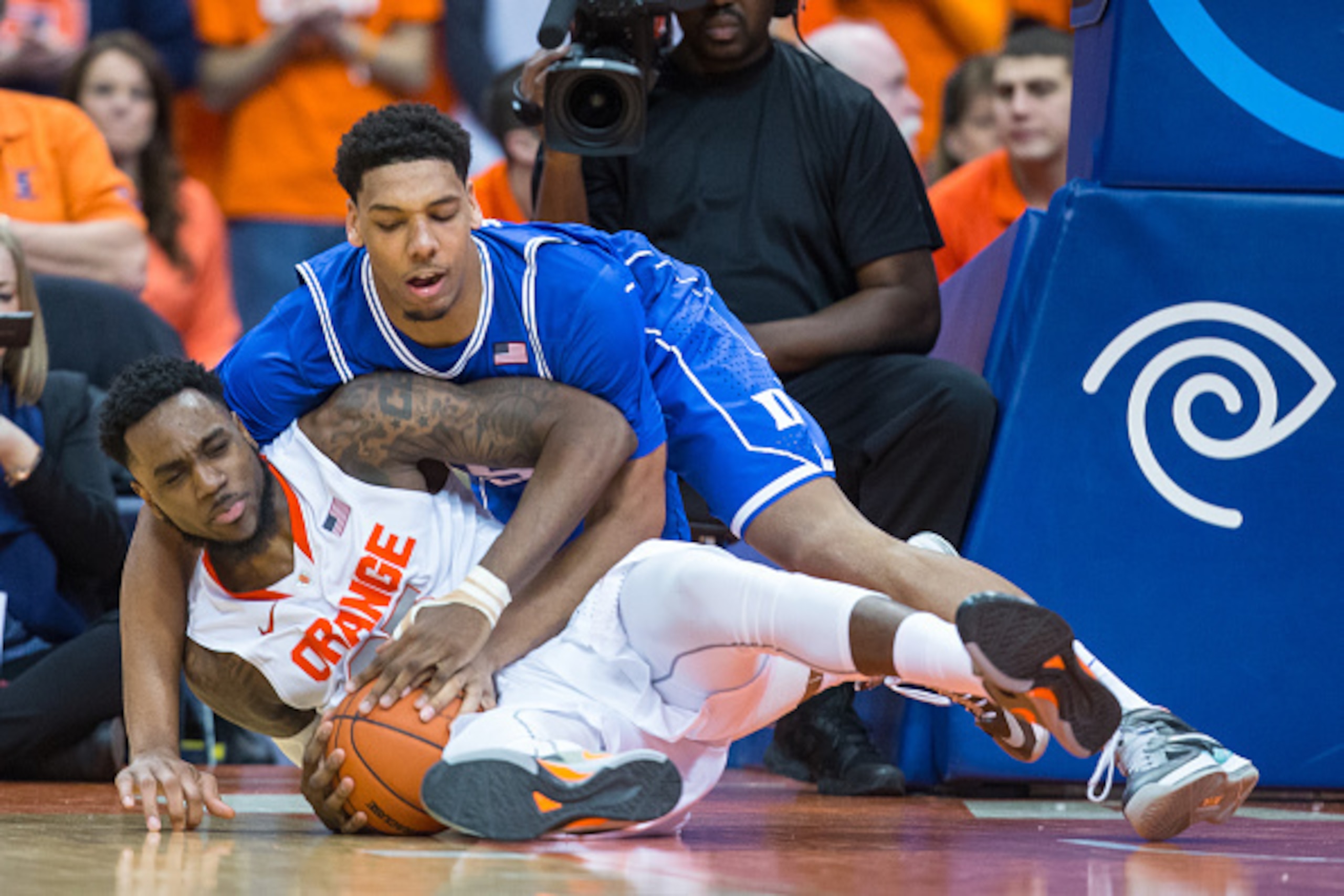 SYRACUSE, NY - FEBRUARY 14:  Rakeem Christmas #25 of the Syracuse Orange and Jahlil Okafor #15 of the Duke Blue Devils fight for a loose ball on February 14, 2015 at The Carrier Dome in Syracuse, New York.  Duke defeats Syracuse 80-72.  (Photo by Brett Ca