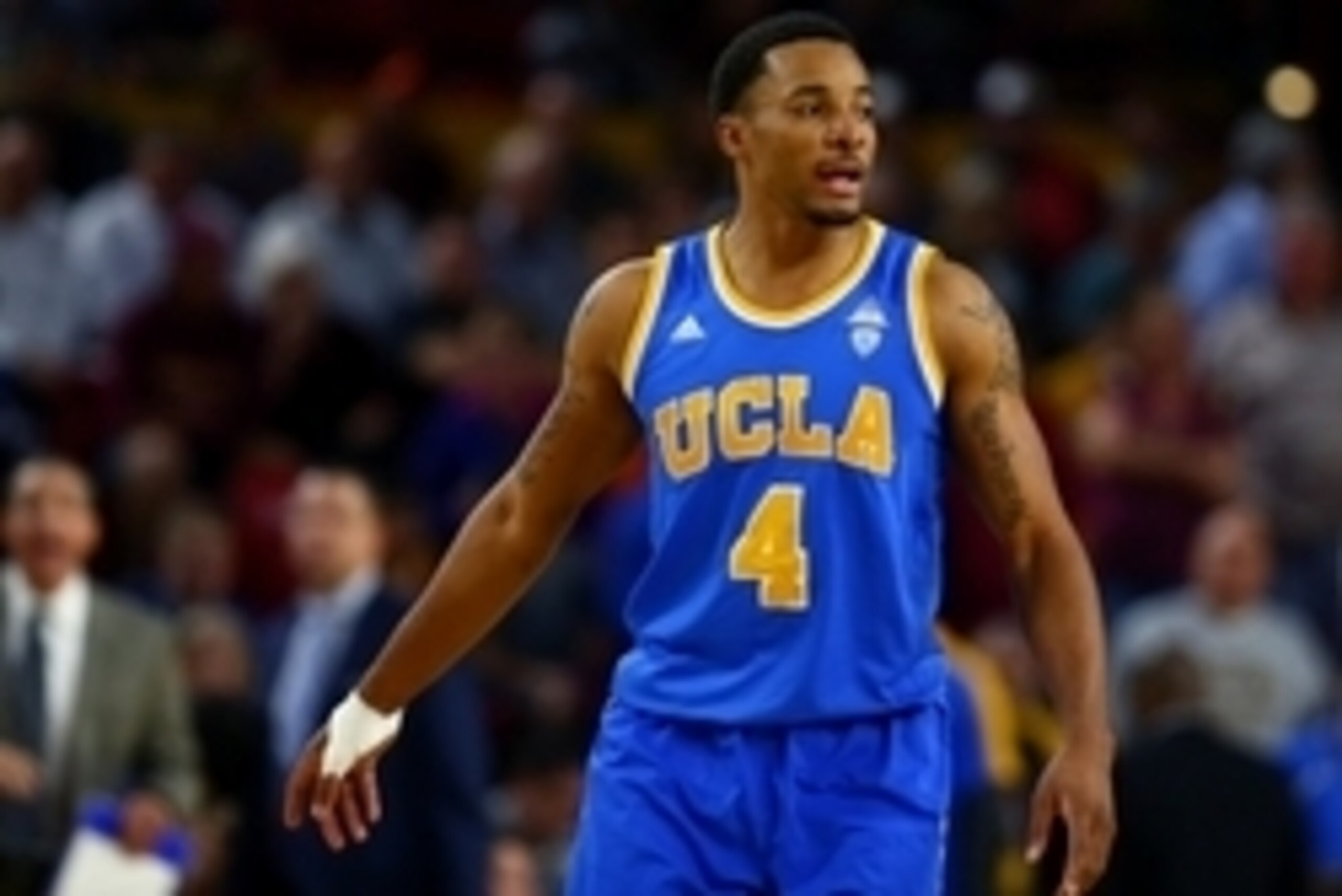 Feb 18, 2015; Tempe, AZ, USA; UCLA Bruins guard Norman Powell (4) against the Arizona State Sun Devils at Wells-Fargo Arena. The Sun Devils defeated the Bruins 68-66. Mandatory Credit: Mark J. Rebilas-USA TODAY Sports