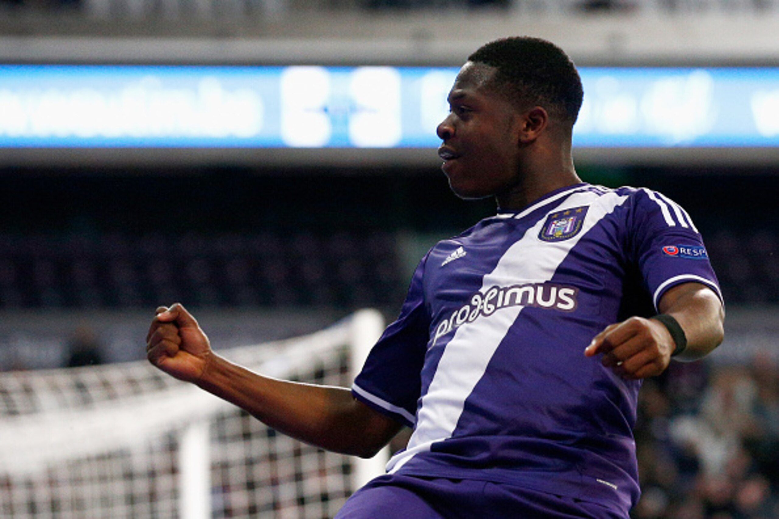 BRUSSELS, BELGIUM - FEBRUARY 23:  Aaron Leya Iseka of Anderlecht celebrates scoring the first goal of the game during the UEFA Youth League Round of 16 match between RSC Anderlecht and FC Barcelona held at Constant Vanden Stock Stadium on February 23, 201