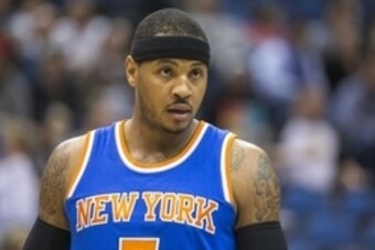Nov 19, 2014; Minneapolis, MN, USA; New York Knicks forward Carmelo Anthony (7) looks on during the first half against the Minnesota Timberwolves at Target Center. Mandatory Credit: Jesse Johnson-USA TODAY Sports