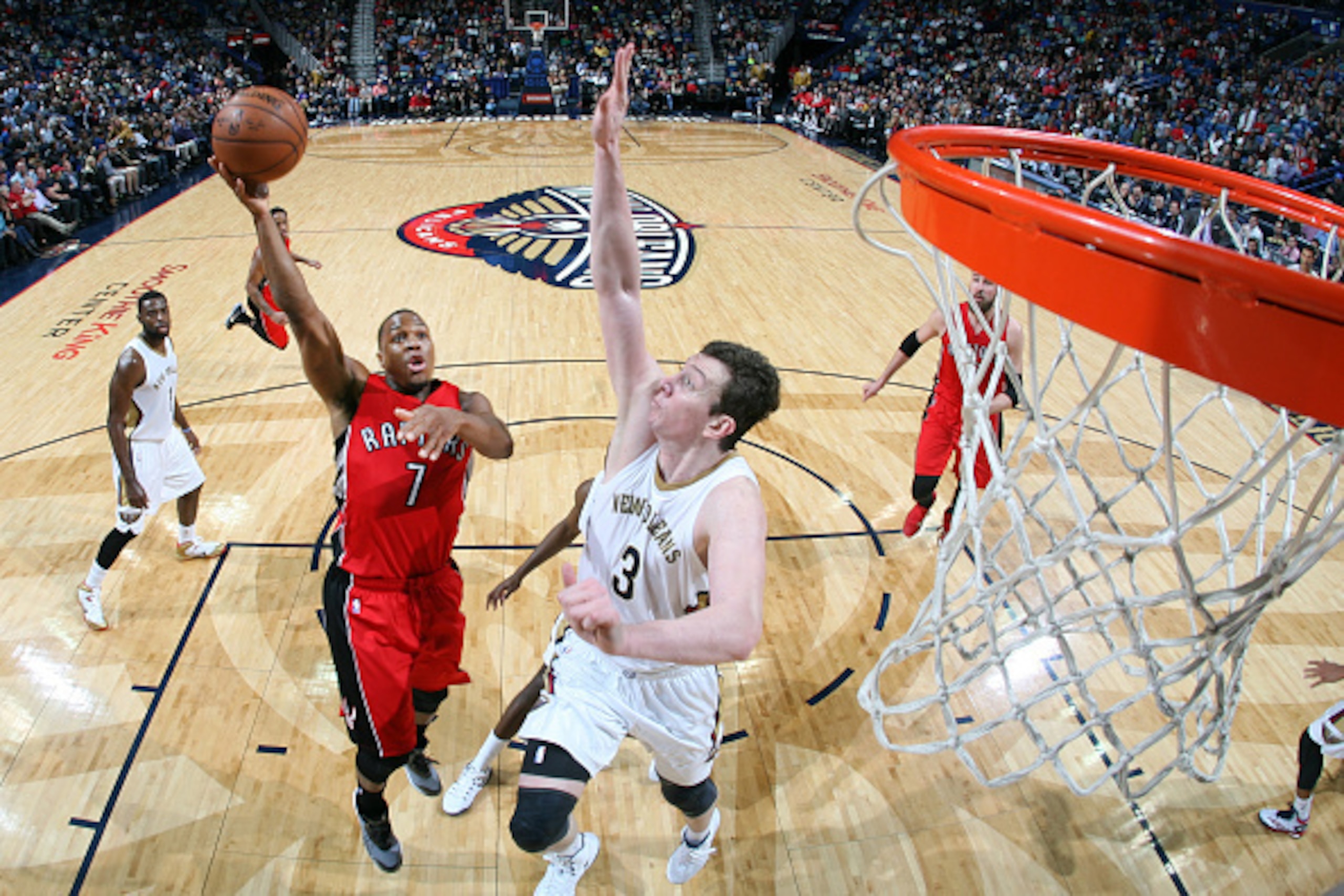 NEW ORLEANS, LA - FEBRUARY 23: Kyle Lowry #7 of the Toronto Raptors goes for the basket against Omer Asik #3 of the New Orleans Pelicans during the game on February 23, 2015 at Smoothie King Center in New Orleans, Louisiana. NOTE TO USER: User expressly a NEW ORLEANS, LA - FEBRUARY 23: Kyle Lowry #7 of the Toronto Raptors goes for the basket against Omer Asik #3 of the New Orleans Pelicans during the game on February 23, 2015 at Smoothie King Center in New Orleans, Louisiana. NOTE TO USER: User expressly a