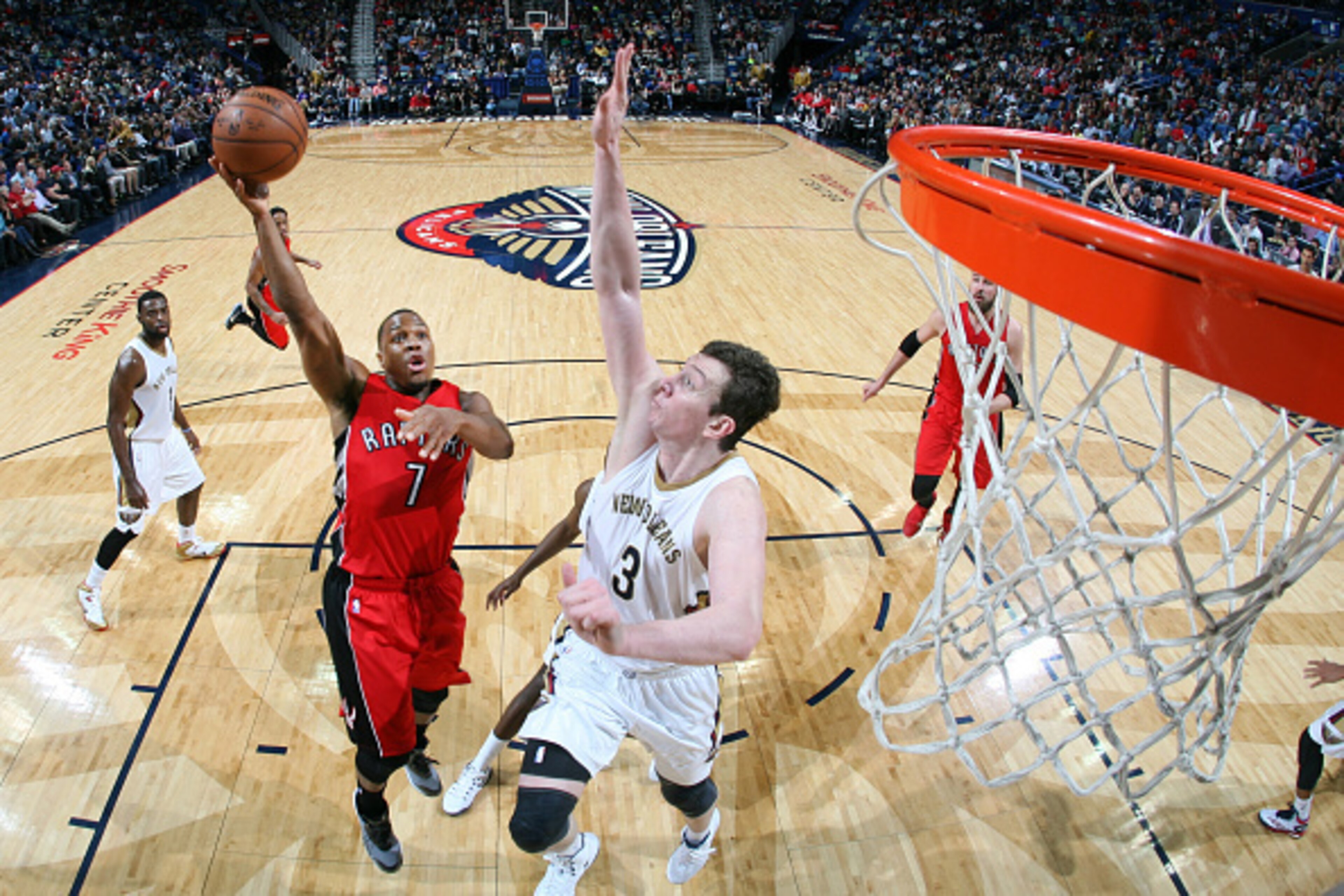 NEW ORLEANS, LA - FEBRUARY 23: Kyle Lowry #7 of the Toronto Raptors goes for the basket against Omer Asik #3 of the New Orleans Pelicans during the game on February 23, 2015 at Smoothie King Center in New Orleans, Louisiana. NOTE TO USER: User expressly a NEW ORLEANS, LA - FEBRUARY 23: Kyle Lowry #7 of the Toronto Raptors goes for the basket against Omer Asik #3 of the New Orleans Pelicans during the game on February 23, 2015 at Smoothie King Center in New Orleans, Louisiana. NOTE TO USER: User expressly a
